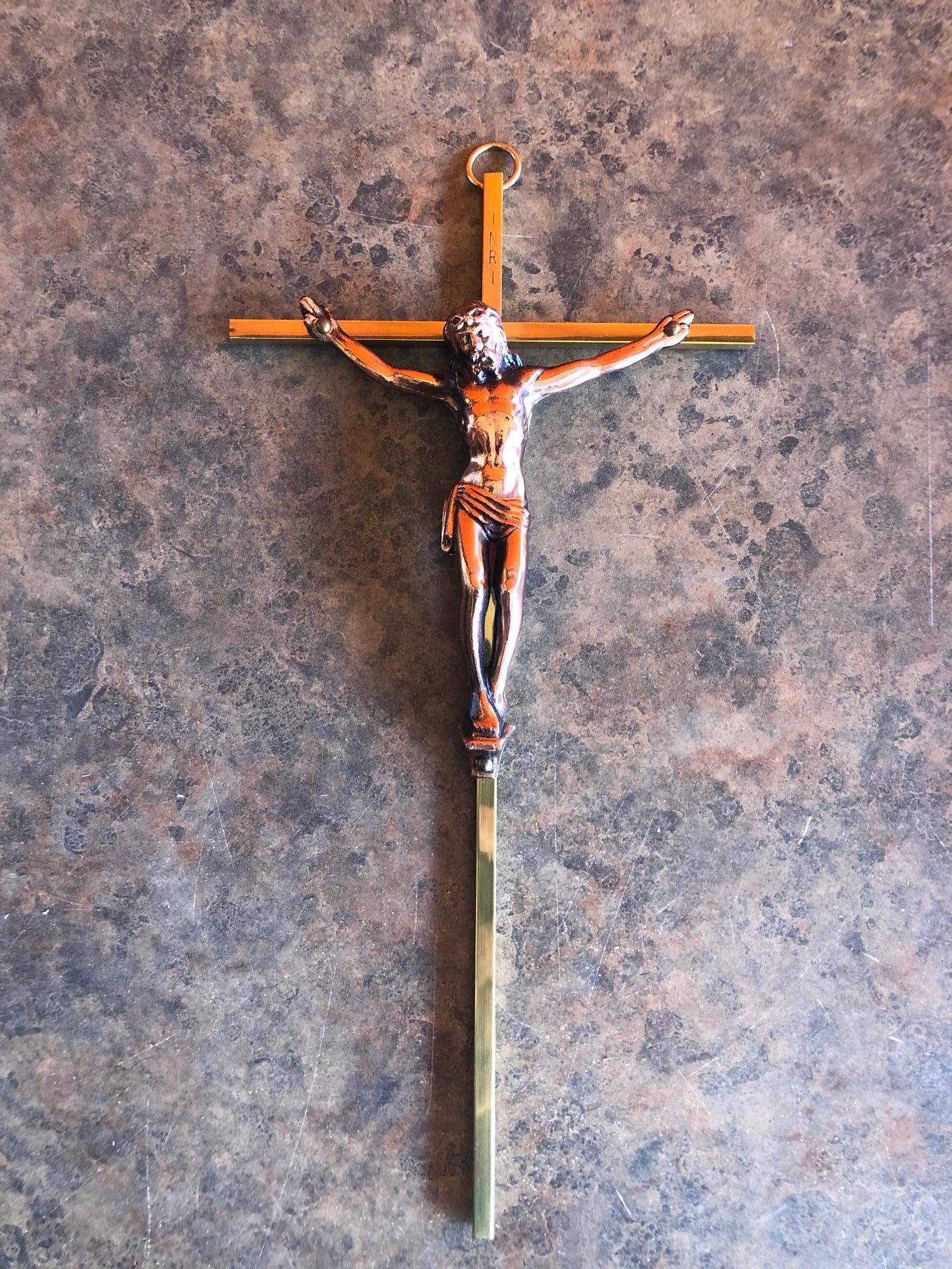 A very nice brass crucifix with a copper Jesus on the cross, circa 1960s. Nice weight and detail.