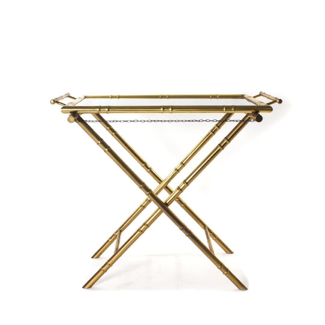 Butler's table with faux bamboo brass frame and smoked glass top. USA, circa 1980.