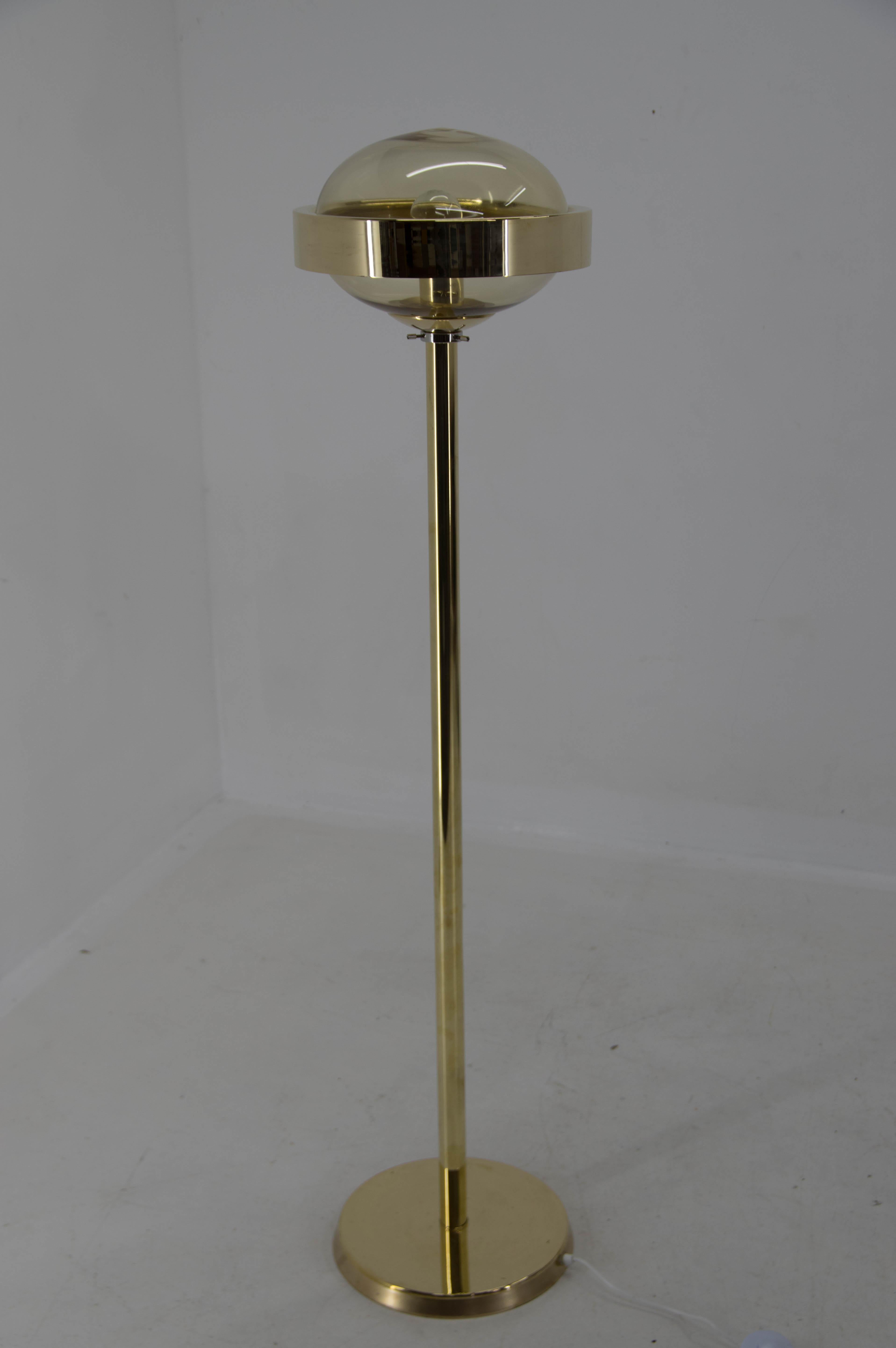 Floor lamp made of brass and smoke glass. 
Made by Preciosa, Kamenicky Senov in Czechoslovakia in 1970s
Restored: brass with minor age patina refinished
Rewired: 1x60W, E25-E27 bulb
US plug adapter included.
 
