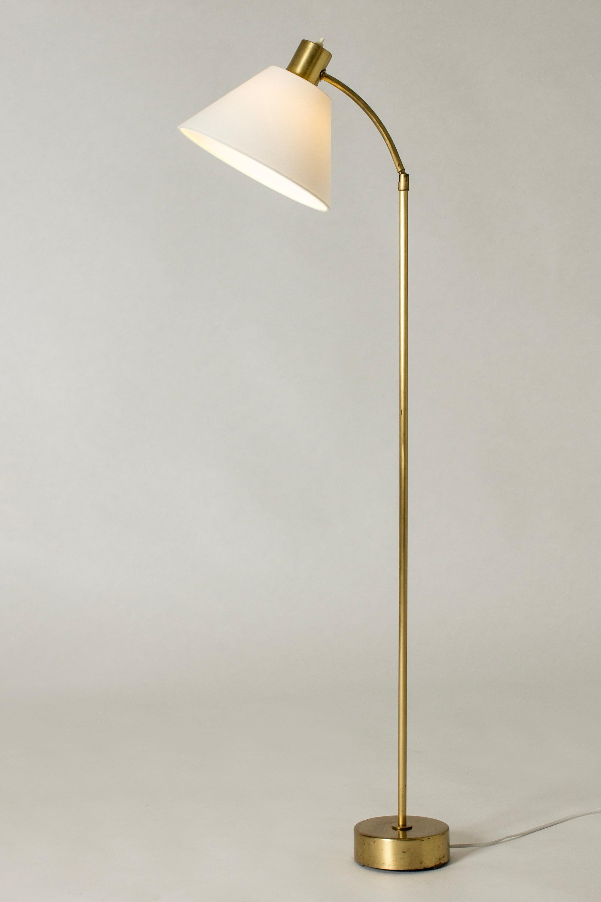 Cool brass floor lamp from Philips, in a neat size. Adjustable neck.