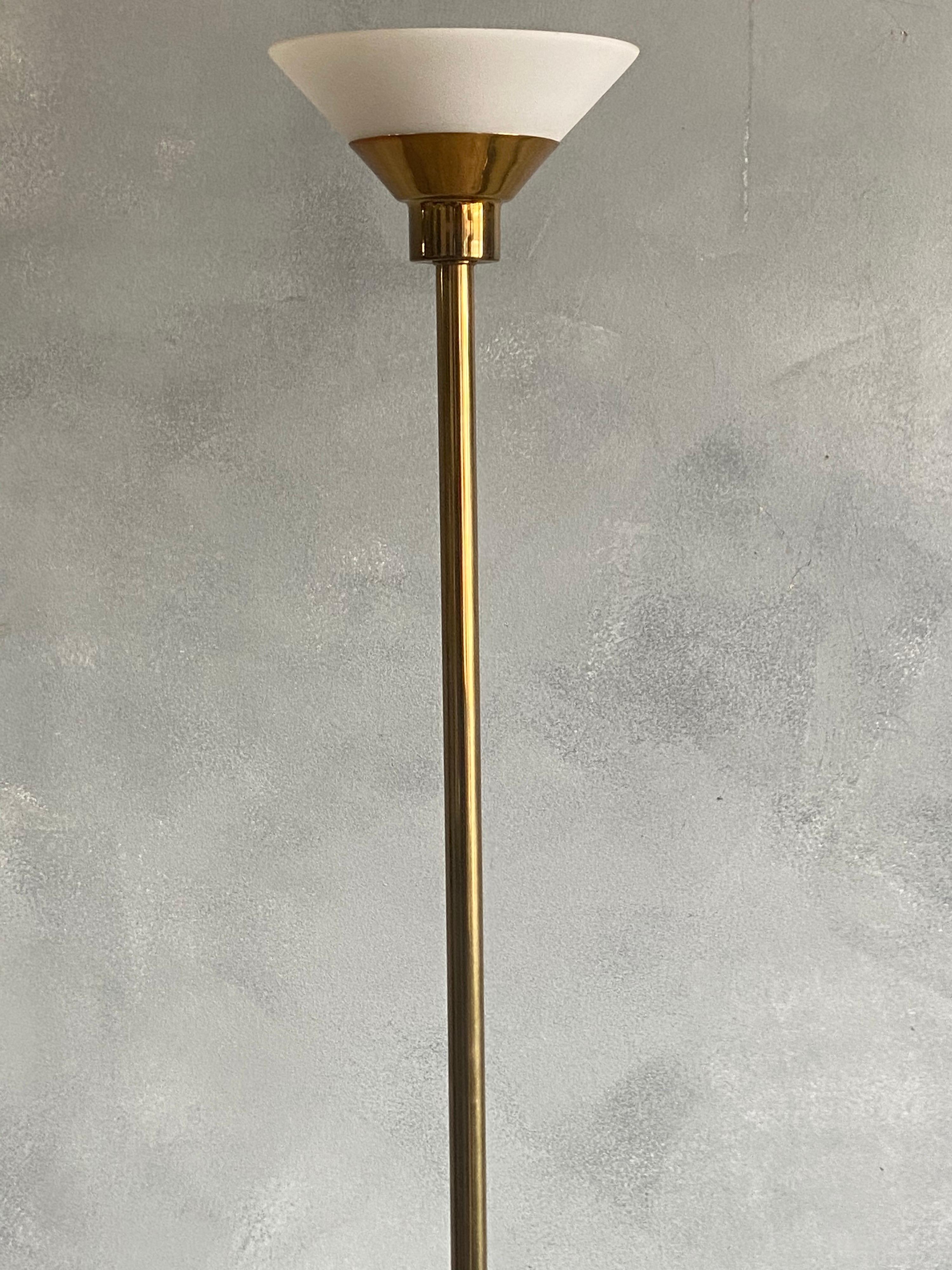 For your consideration is this elegant and space saving floor lamp with white glass shade. It takes a halogen bulb and there are LED replacements. In working order and ready for use.