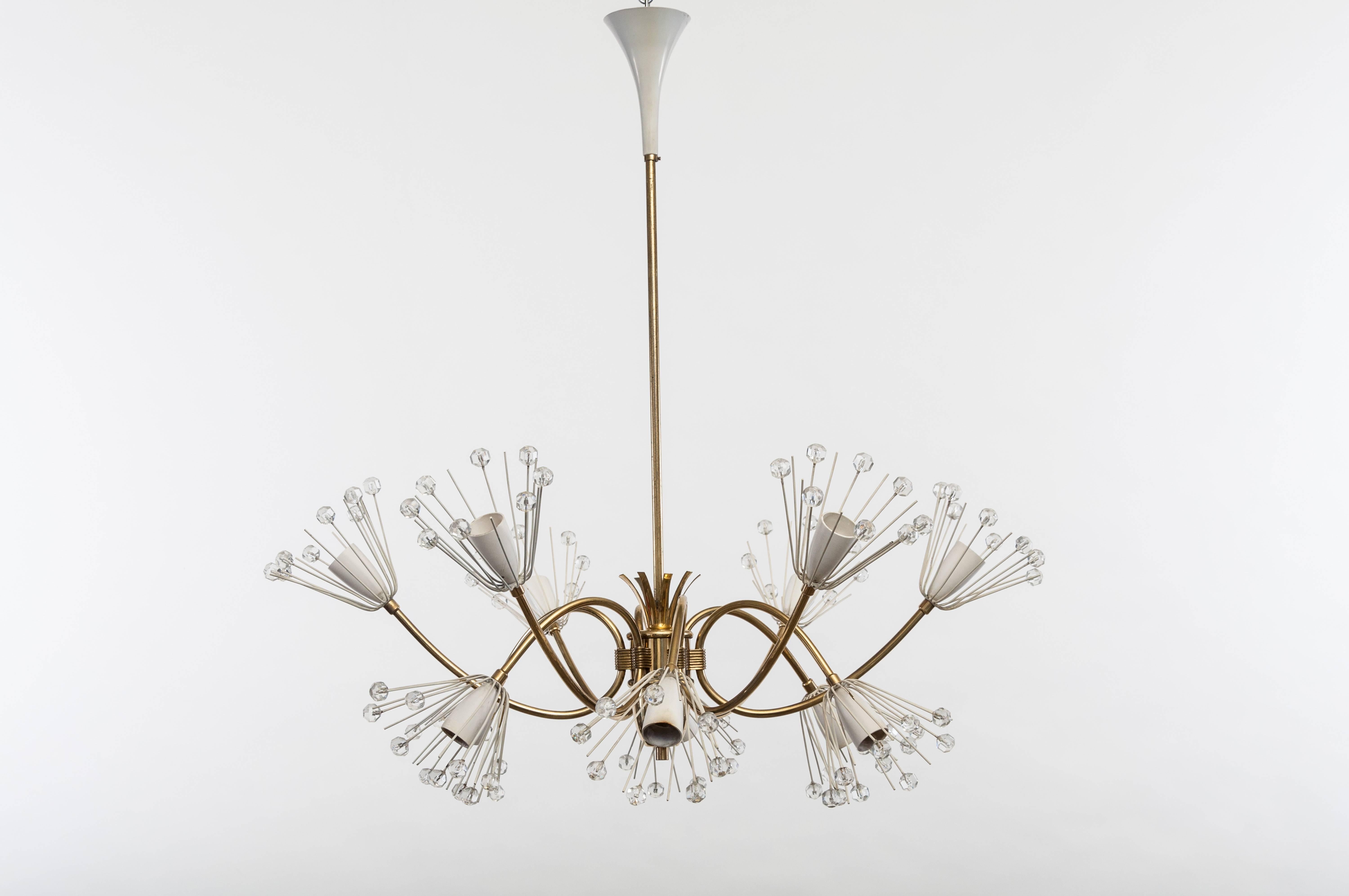 A very elegant and hard to find chandelier by Emil Stejnar, which was manufactured by Rupert Nikoll.
A midcentury six + six arms solid brass Design lamp by Emil Stejnar. White painted crystal cupholder with white E14 period sockets.
The brass arms