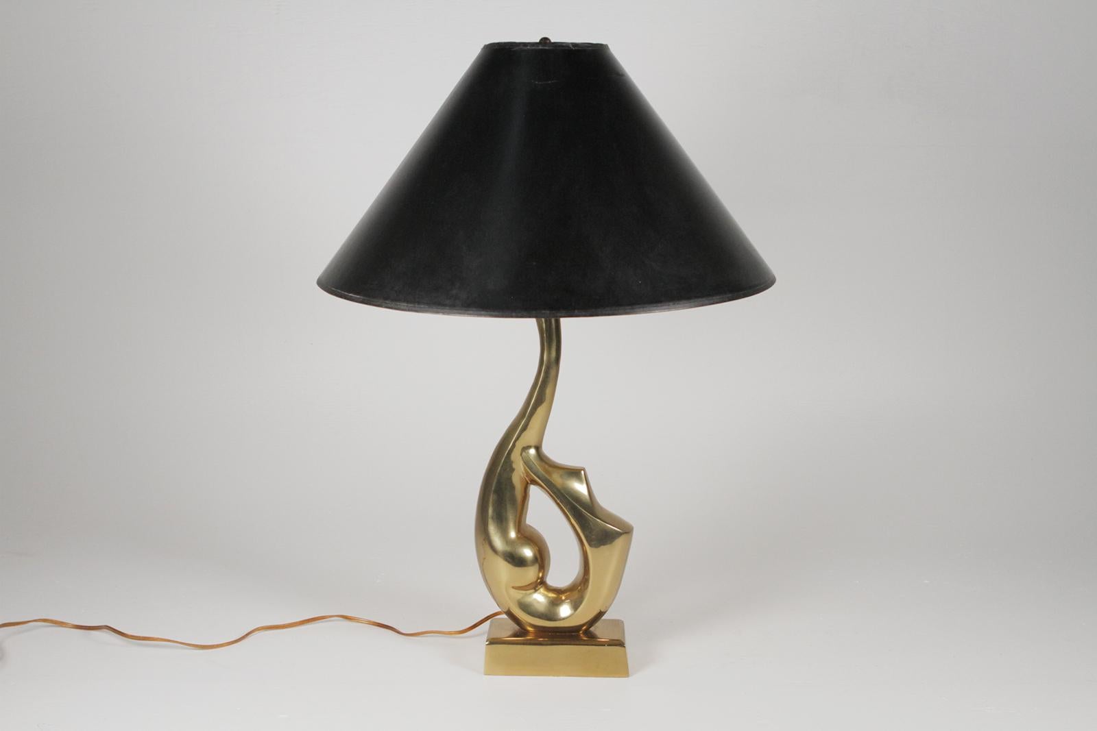 Midcentury brass lamp in the form of a swimmer
Dimensions 7’ W x 3.5