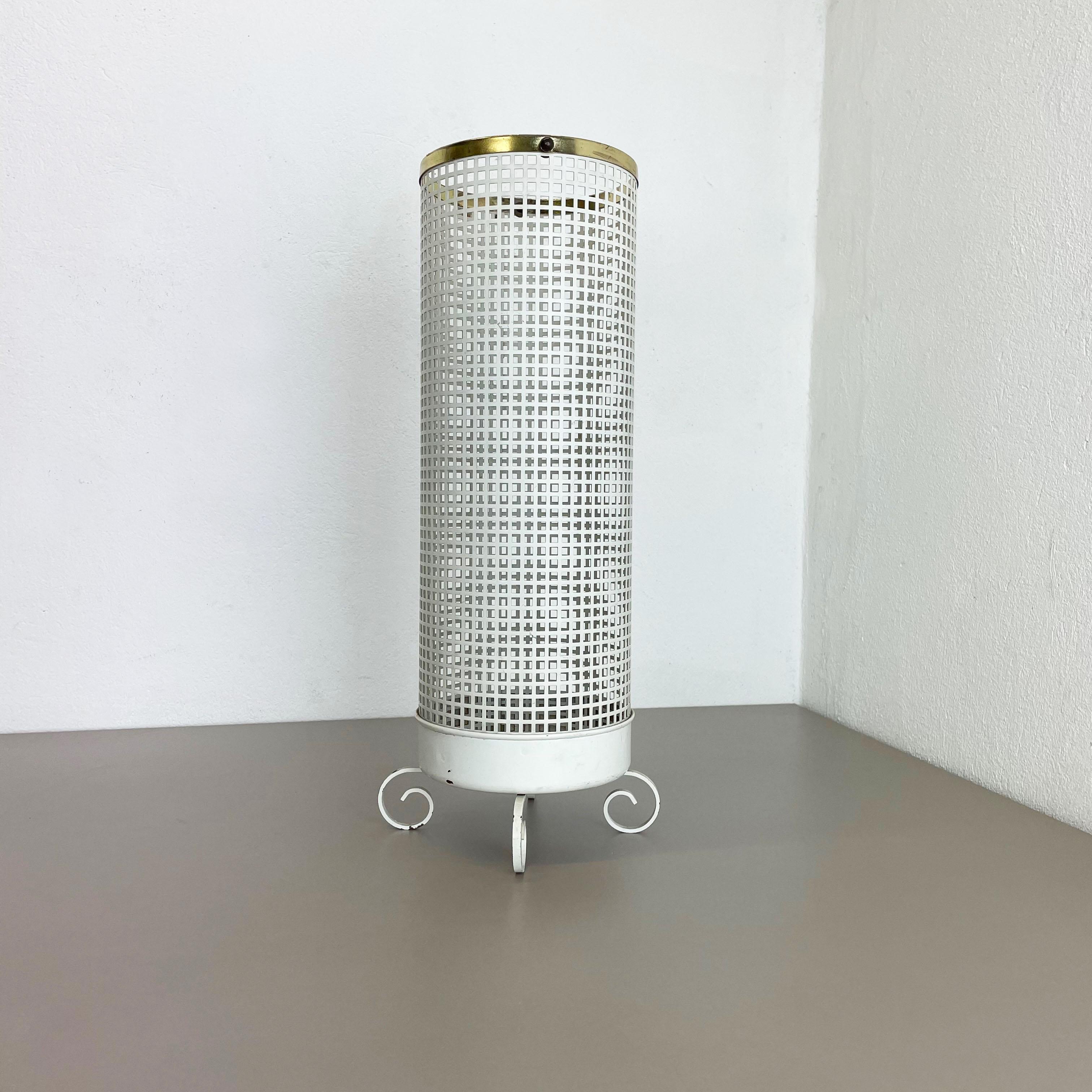 Article:

Umbrella stand in style of Matégot



Origin:

France


Age:

1950s



This original vintage umbrella stand element was produced in the 1950s in France. It is made of solid metal in a white lacquered tone with perforated