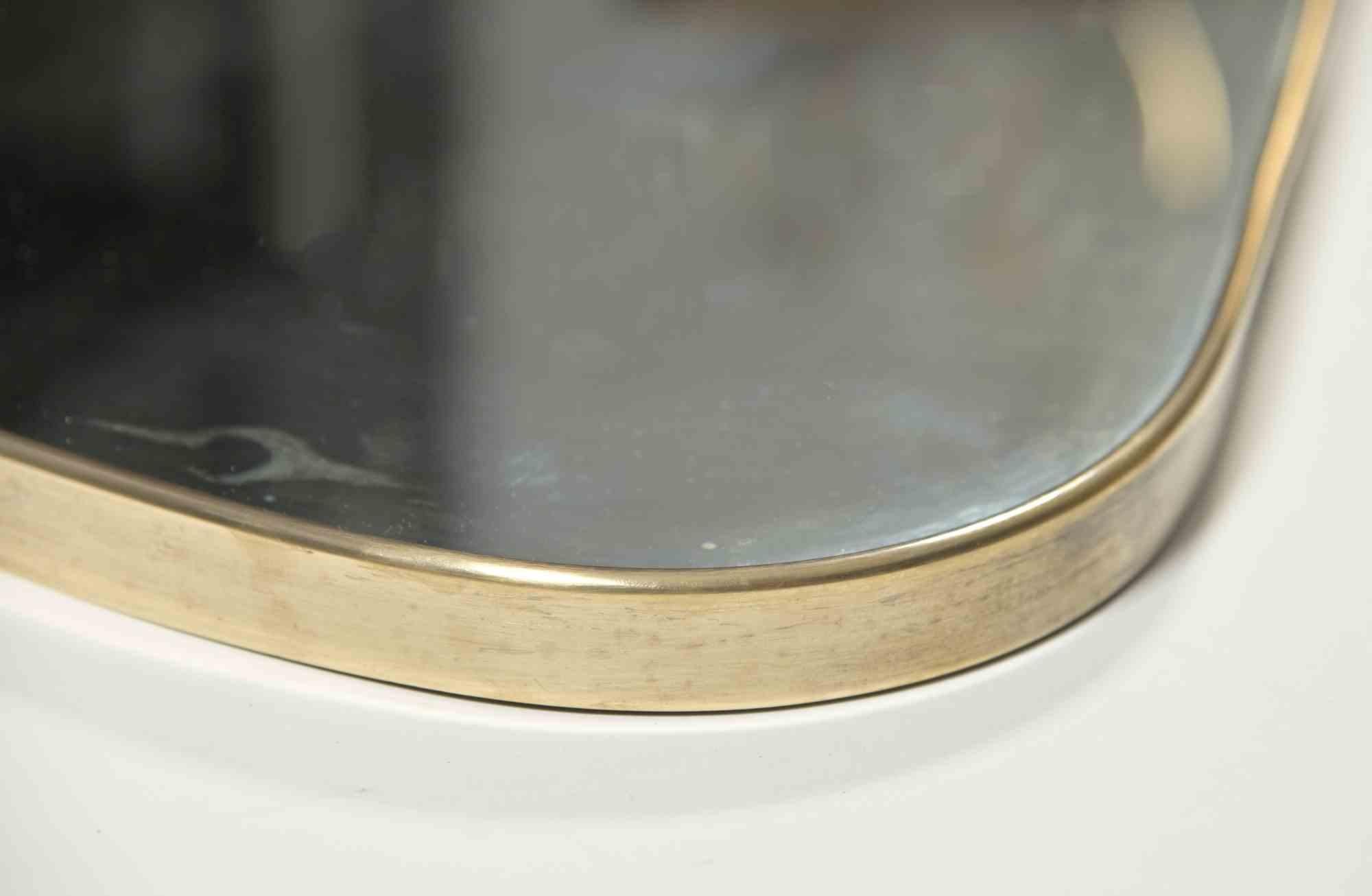 Midcentury Brass Mirror, italian production.

Good condition.