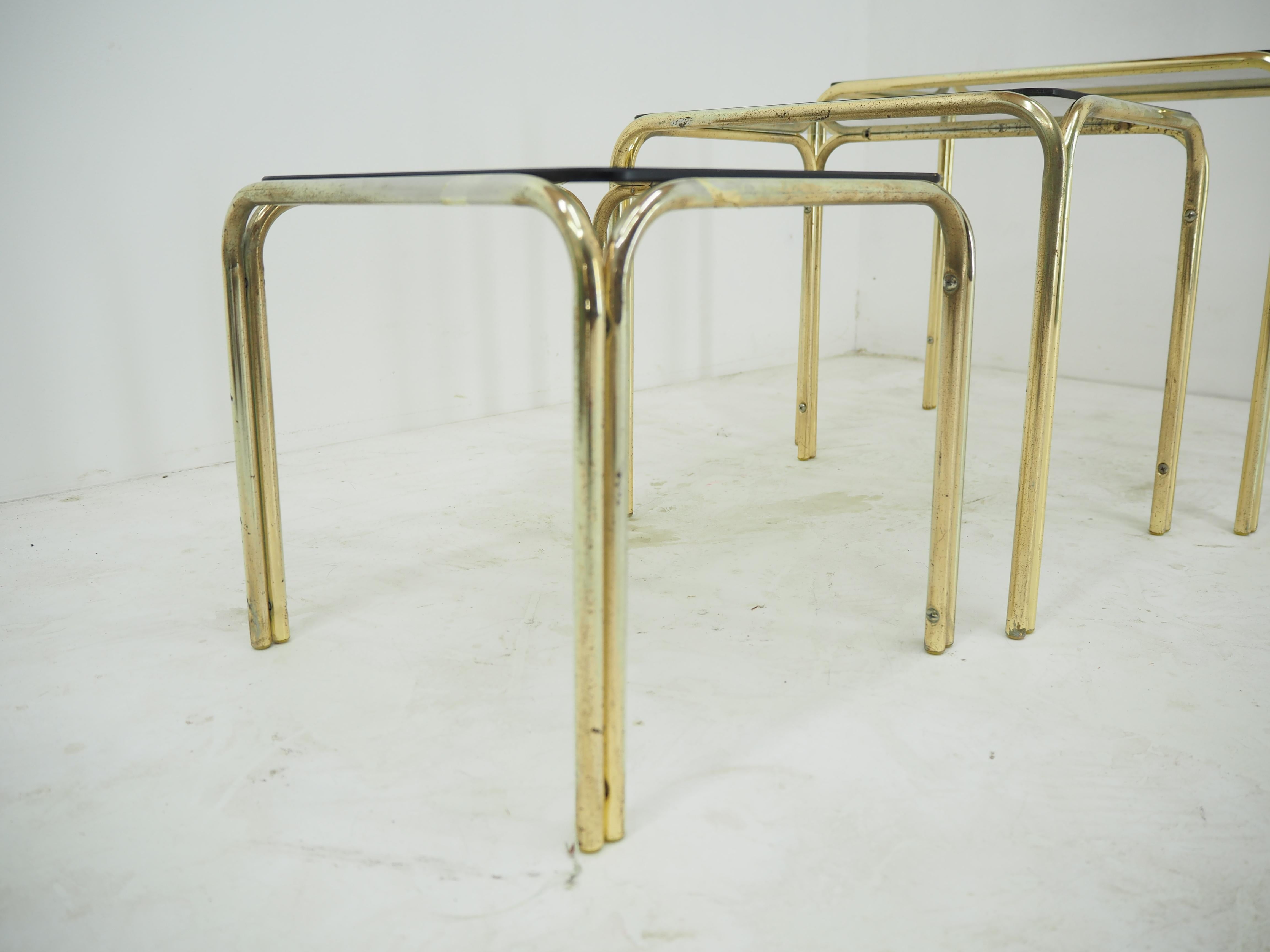 Late 20th Century Midcentury Brass & Smoked Glass Nesting Tables, 1970s For Sale