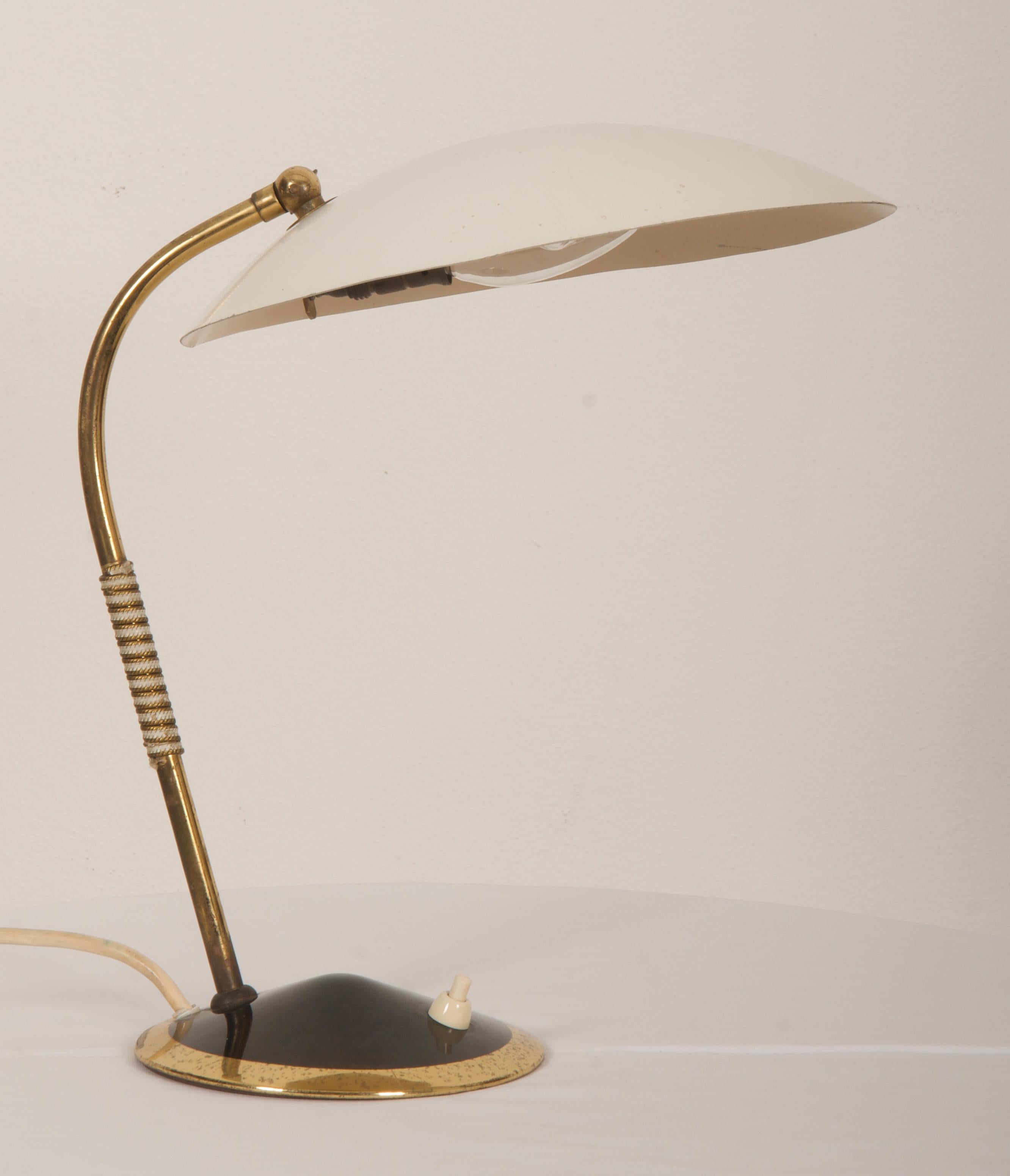 Brass / steel construction with a spherical cap shaped lampshade white painted fitted with one E14 socket, model. Designed circa 1950 in Vienna.
Beautiful original condition.
 