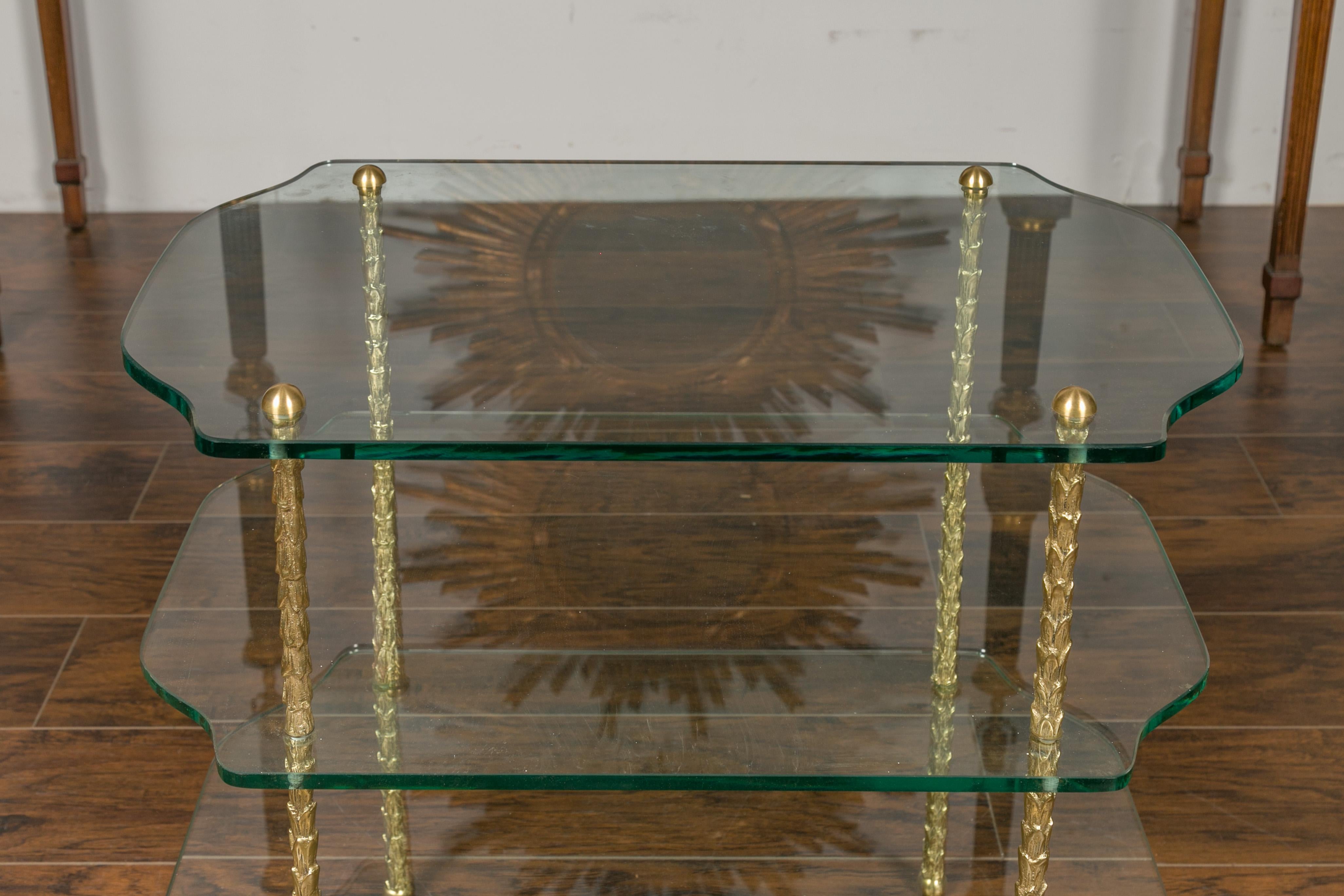 Mid-Century Modern Midcentury Brass Three-Tiered Table with Glass Shelves and Foliage Motifs For Sale