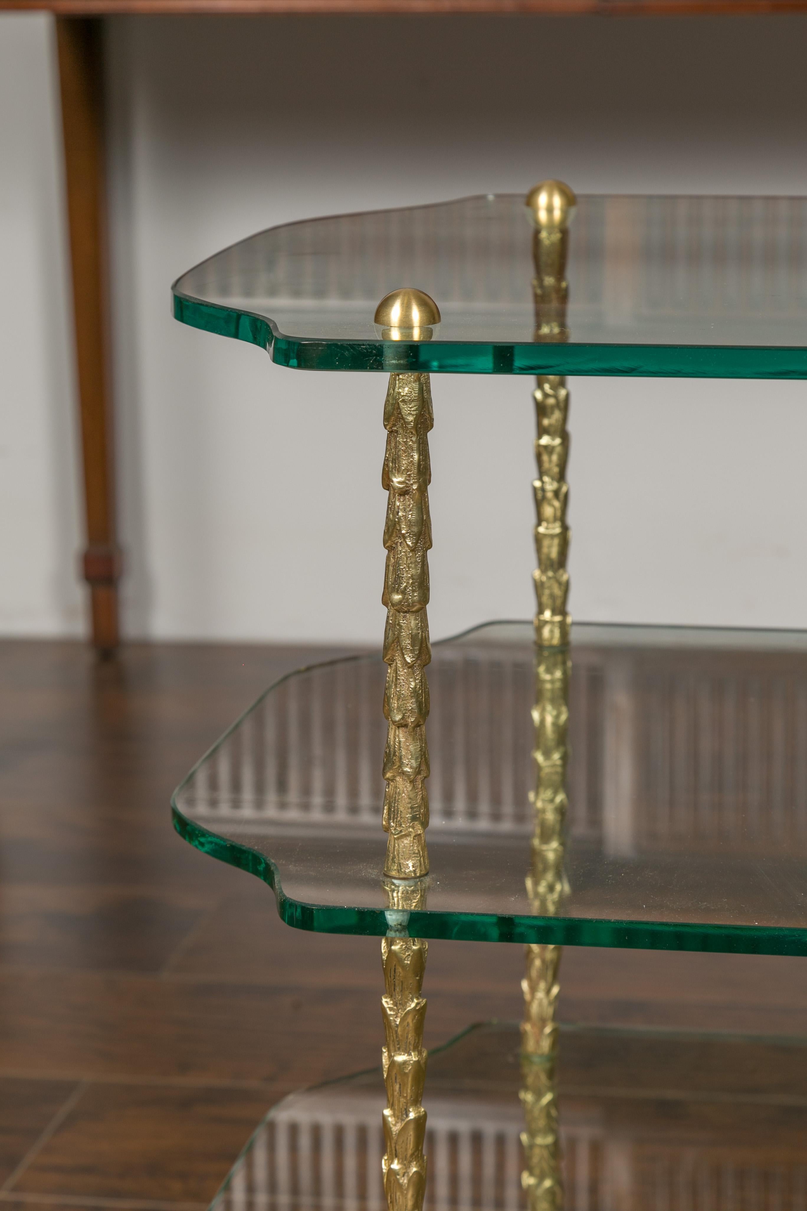 Midcentury Brass Three-Tiered Table with Glass Shelves and Foliage Motifs In Good Condition For Sale In Atlanta, GA