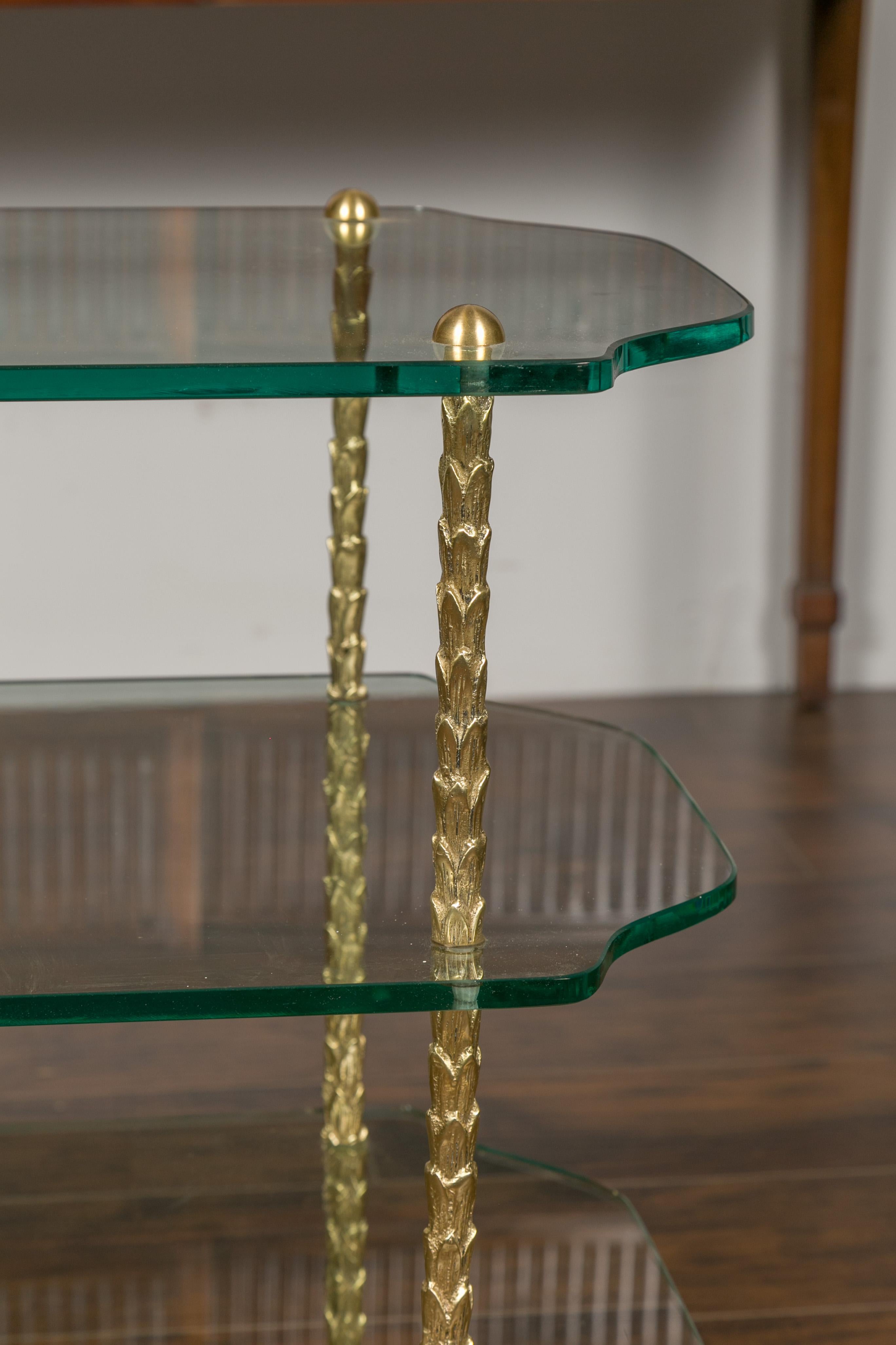 20th Century Midcentury Brass Three-Tiered Table with Glass Shelves and Foliage Motifs For Sale
