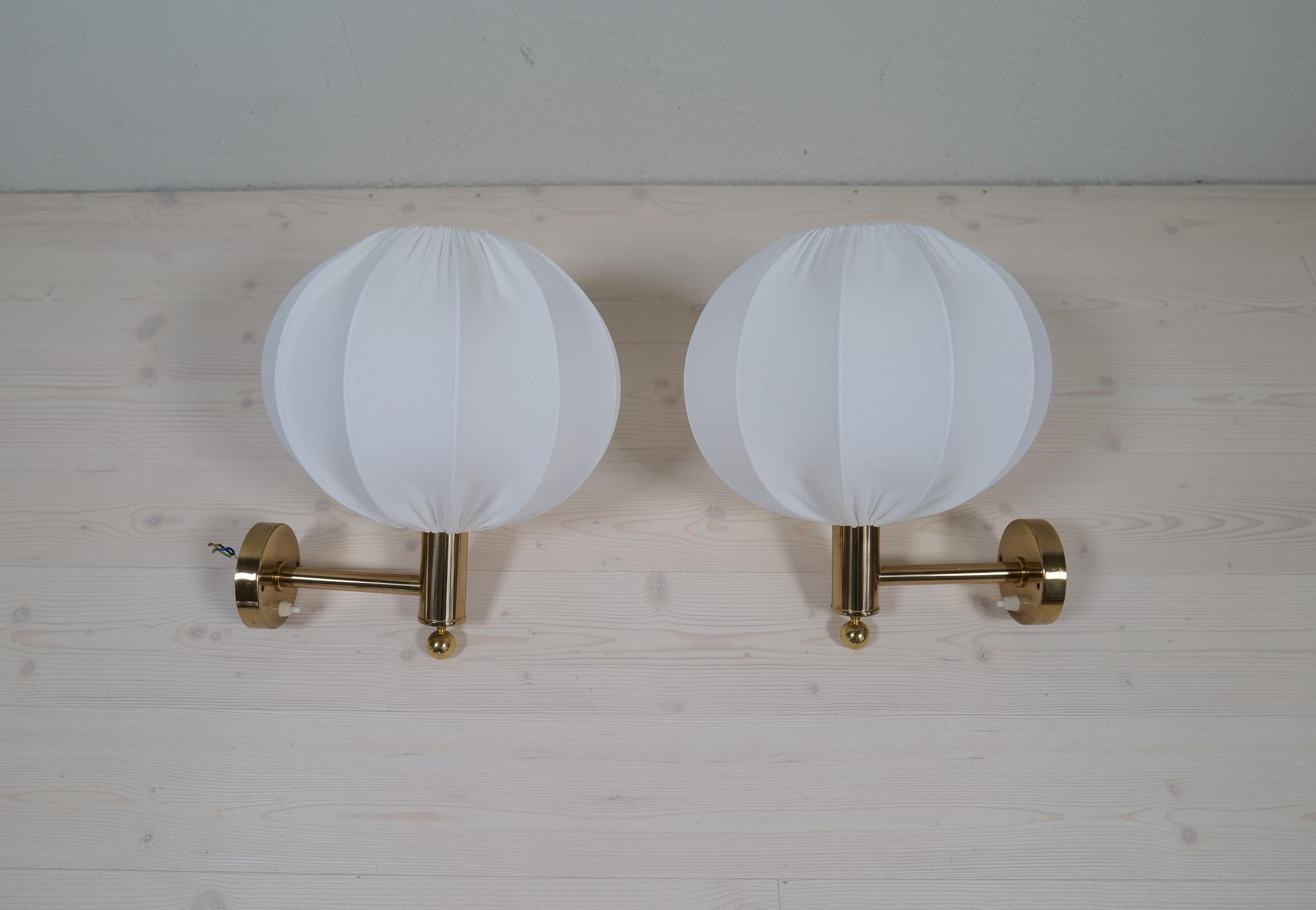 Midcentury Modern Brass Wall Lights with Cotton shades, Sweden, 1960s 4