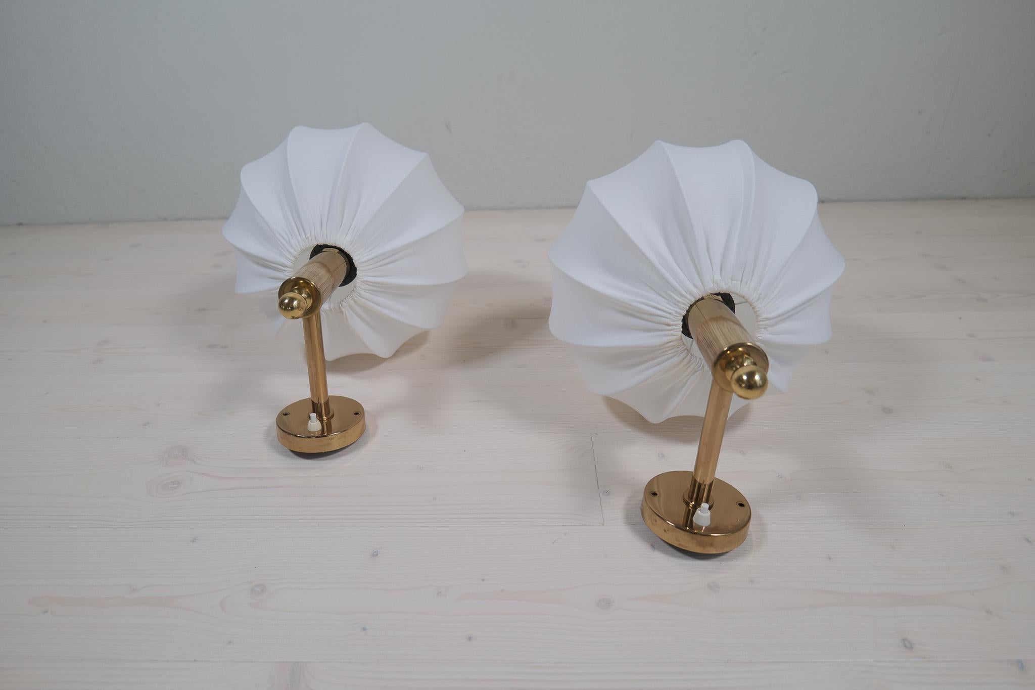 Swedish Midcentury Modern Brass Wall Lights with Cotton shades, Sweden, 1960s