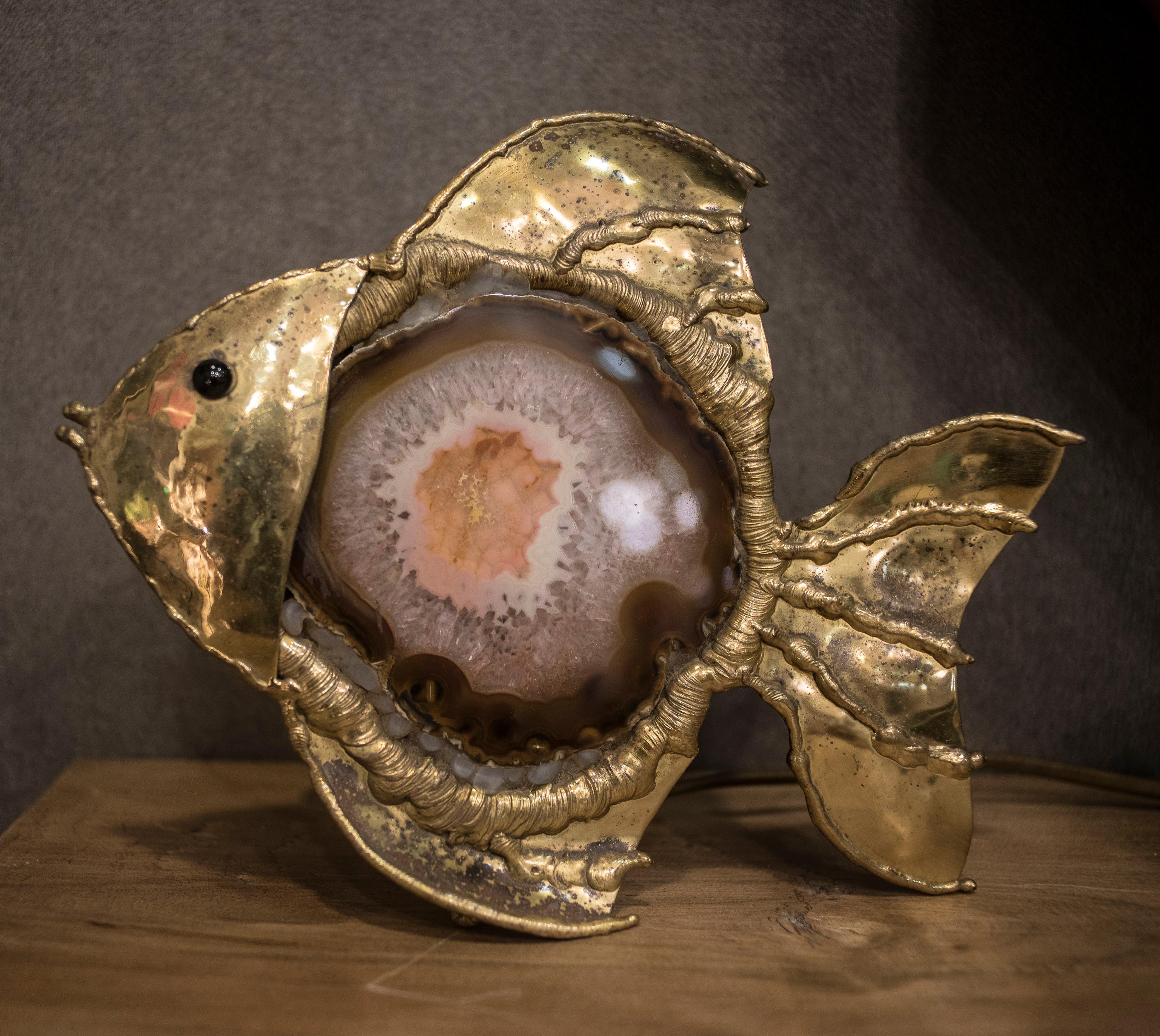 One of a kind brass French table lamp, fish shapped with a beautiful agata stone .
Exquisite in any corner.