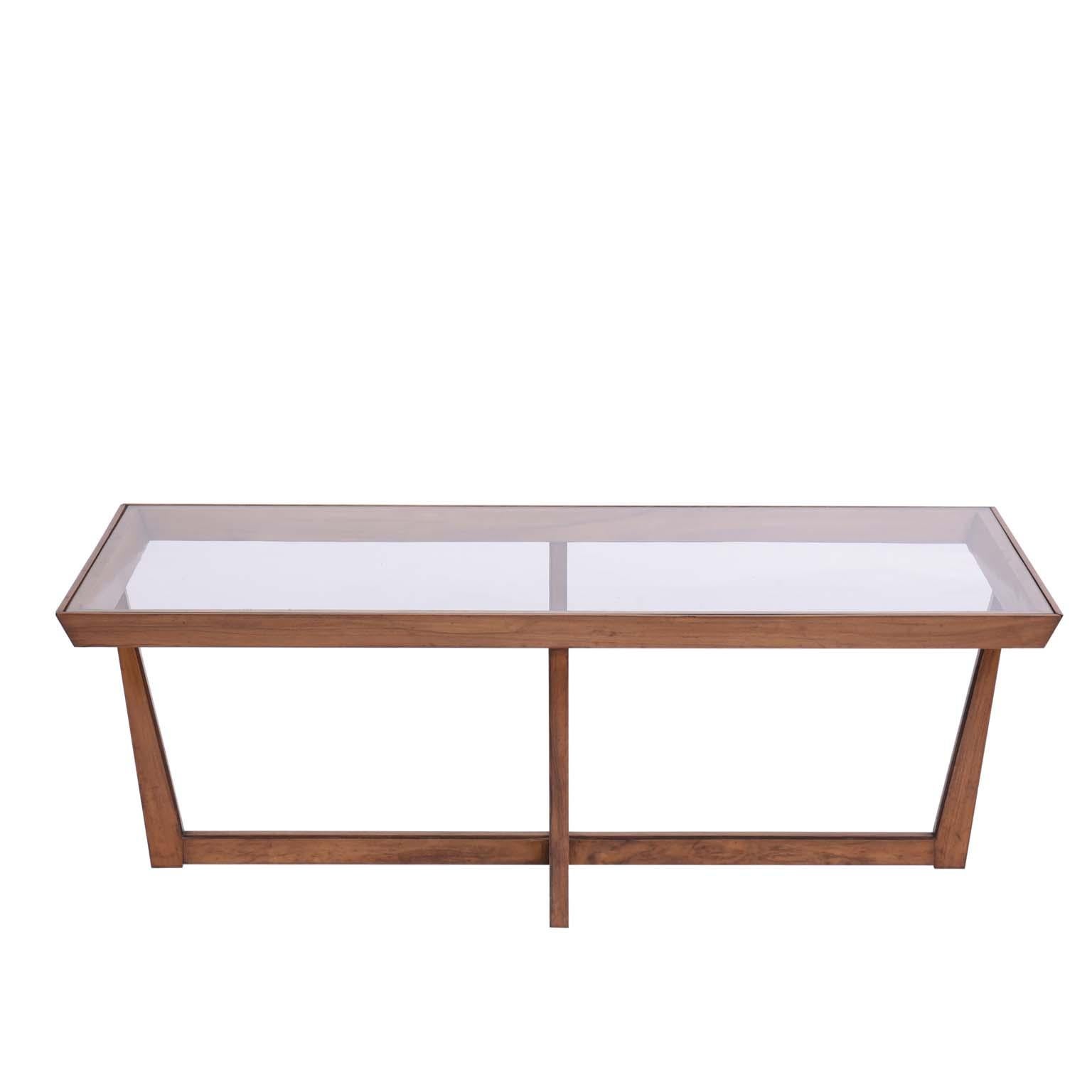 Midcentury Brazilian center table, 1960s

With a modernist design, this beautiful table with cleverly constructed wooden structure has a glass top over the whole structure, which gives the impression of transparency.