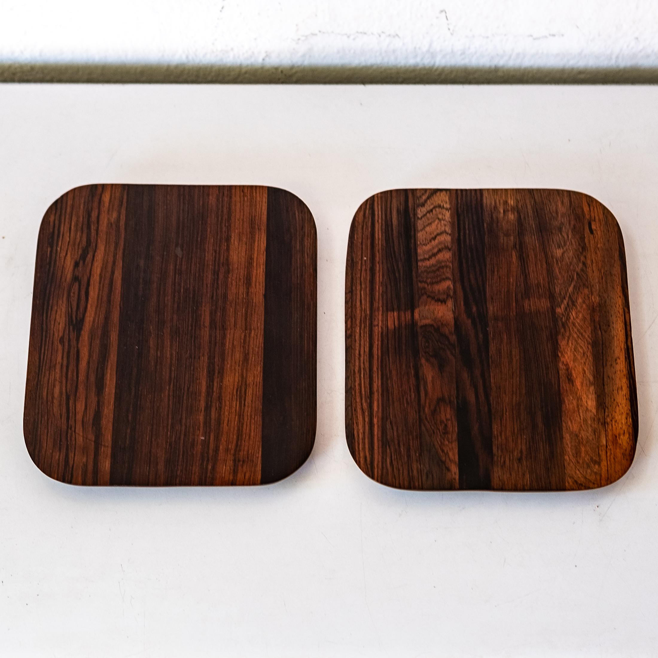 A pair of Brazilian Modern Jean Gillon Wood Art solid Jacaranda trays. Retains the original labels. 1960s, Brazil.