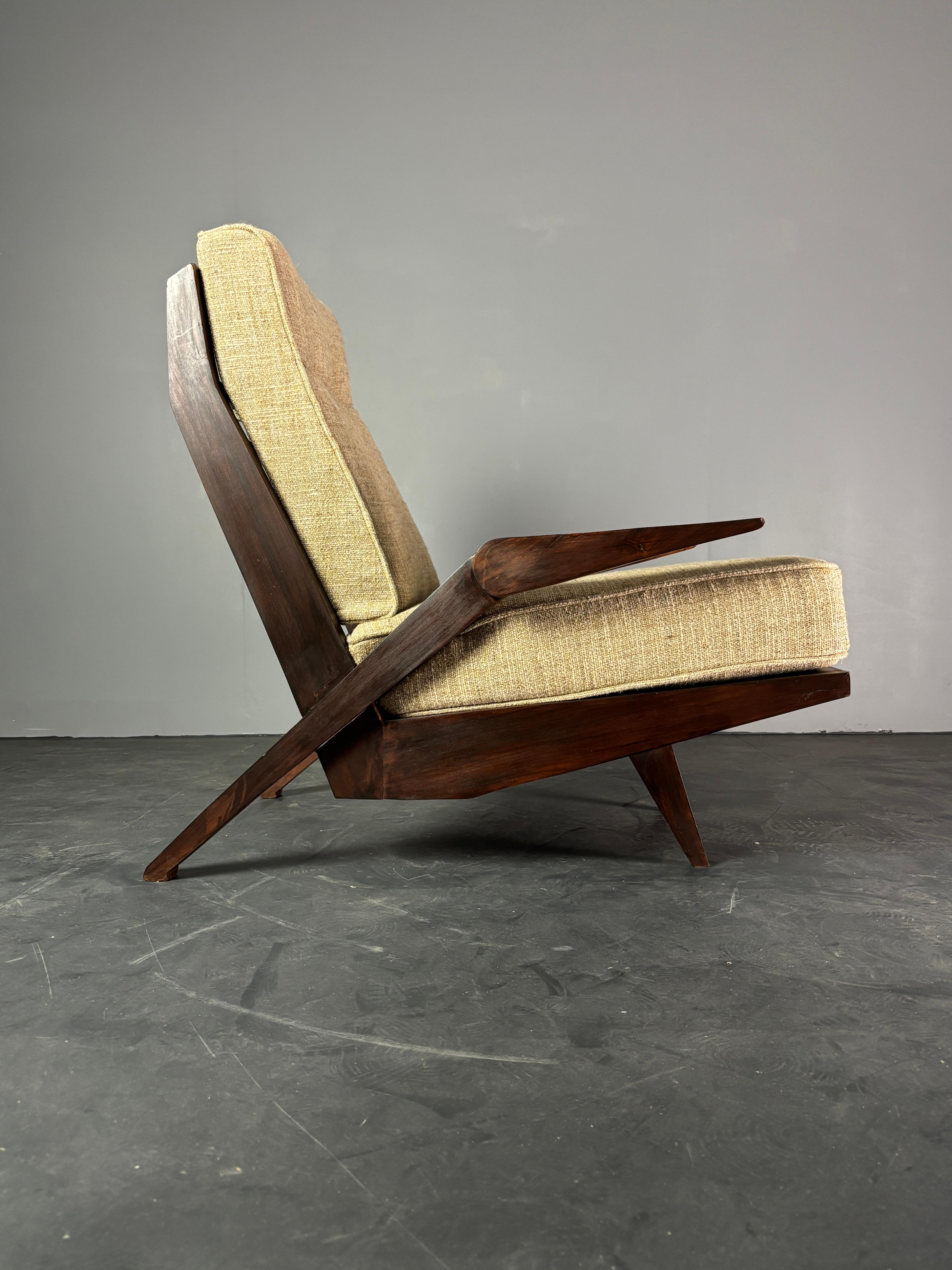 This rare lounge chair by renowned architect and one of the founders of modernism in North Brazil, Acacia Gil Borsoi is a true example of midcentury Brazilian furniture. This chair is made in solid Pau Ferro hardwood only found in certain parts in