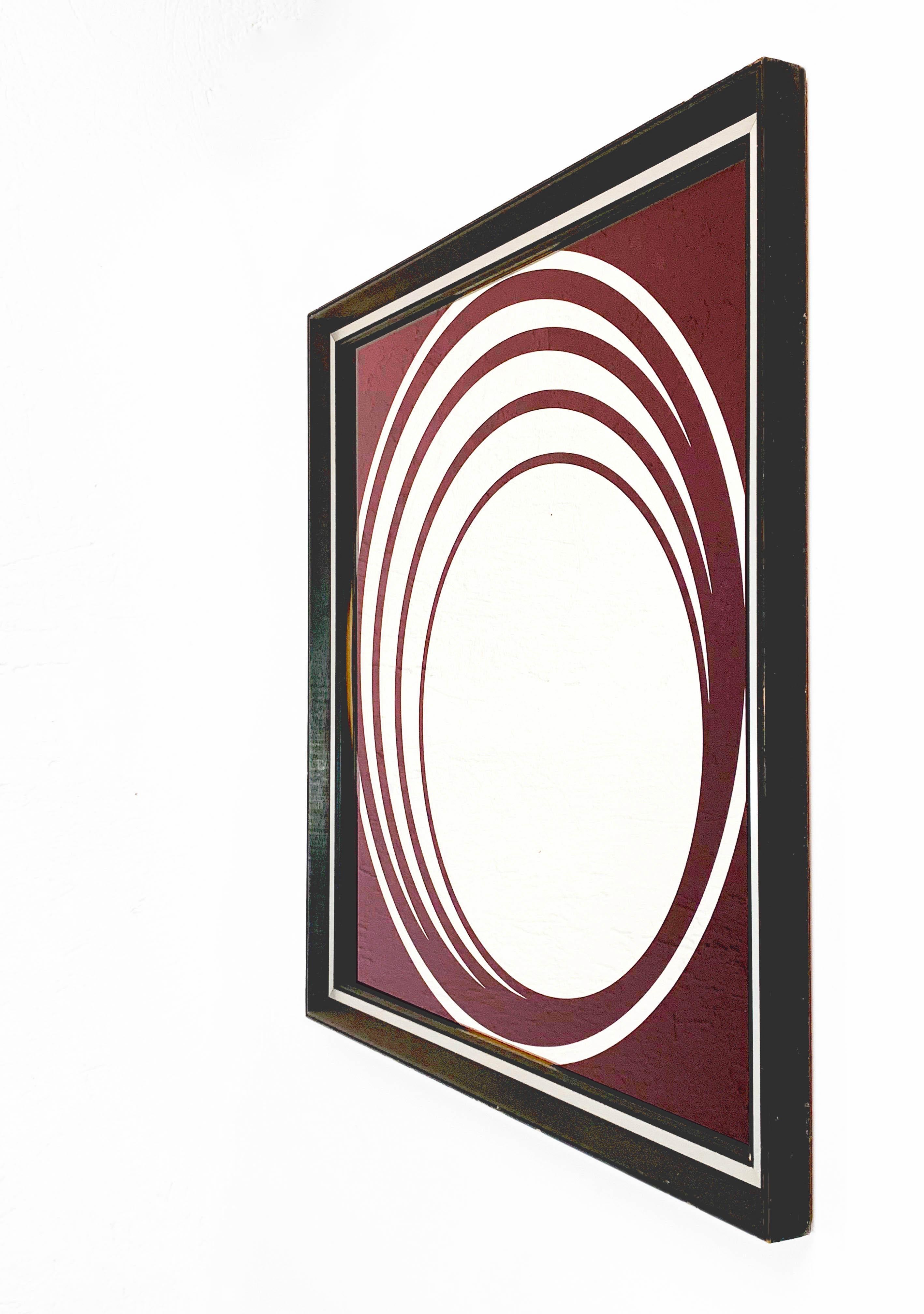Midcentury British burgundy wall mirror with optical effect after Verner Panton with a black frame.

It is an English vintage piece from the 1970s with an iconic vertigo optical effect.

A funky and elegant piece the will deep a midcentury