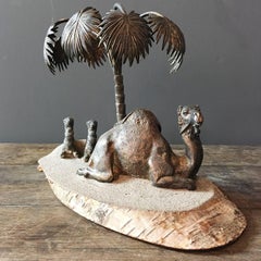 Bronzeskulptur Kamel und Palme aus der Jahrhundertmitte