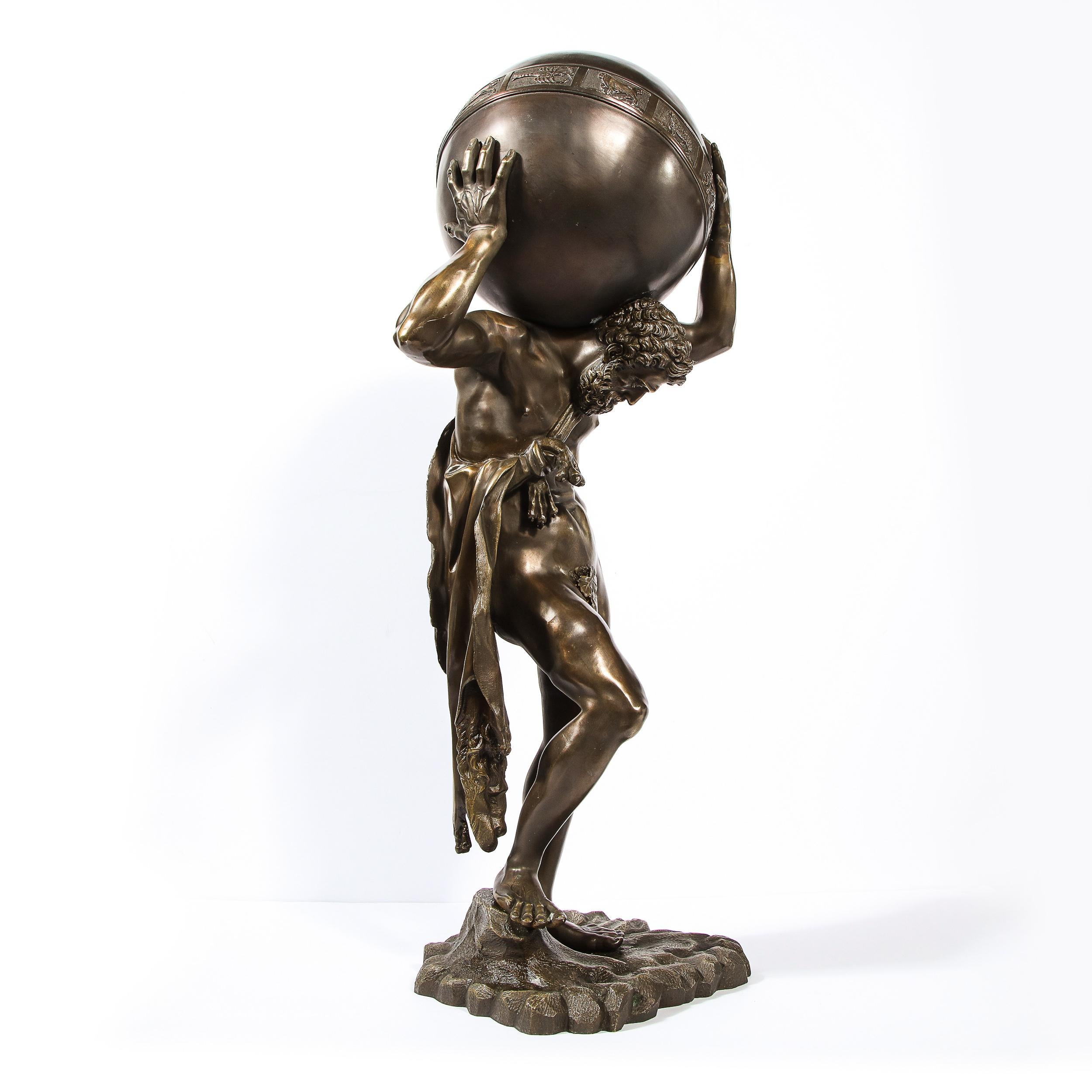 This stunning and beautifully crafted bronze sculpture was realized in the United States, circa 1960. It presents Atlas- the Titan in Greek mythology condemned to hold up the celestial heavens or sky for eternity after the Titanomachy (a ten year