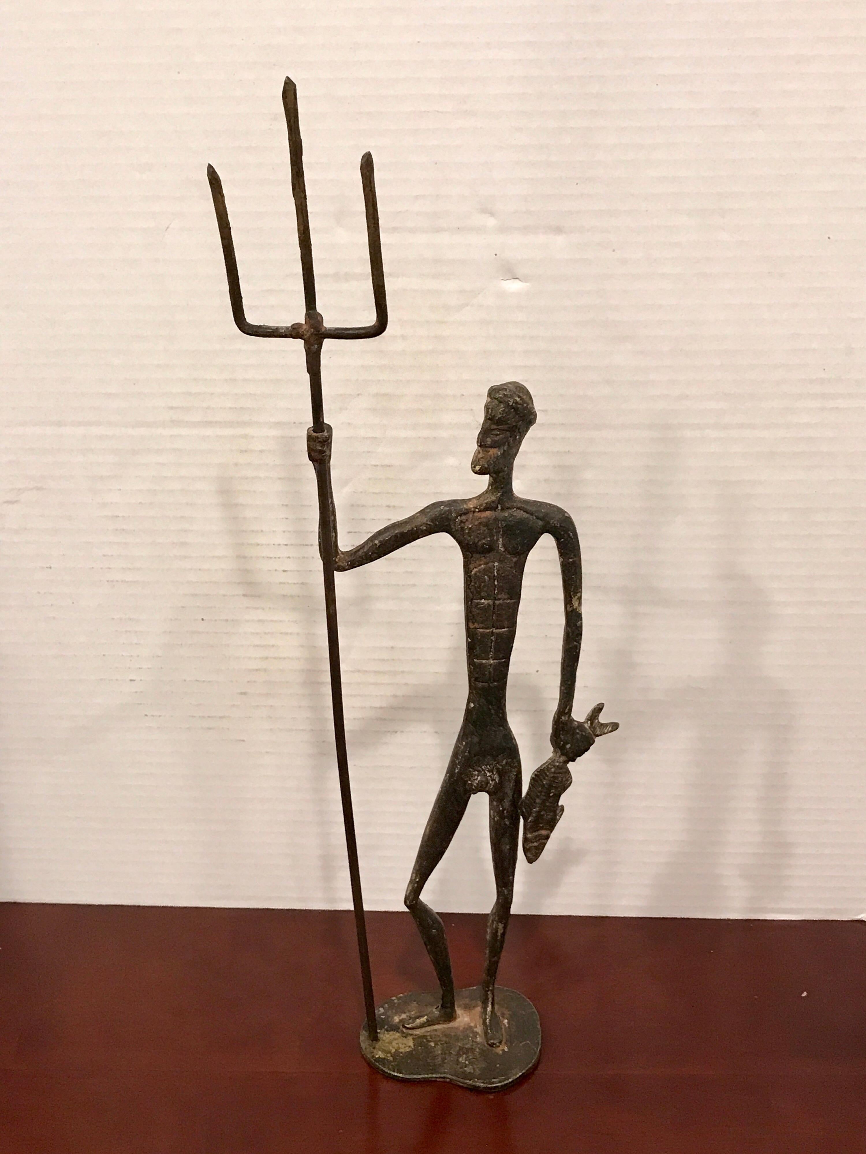 Midcentury bronze sculpture of Poseidon, The standing figure holding a fish in his left hand and a trident in his left. Unsigned.