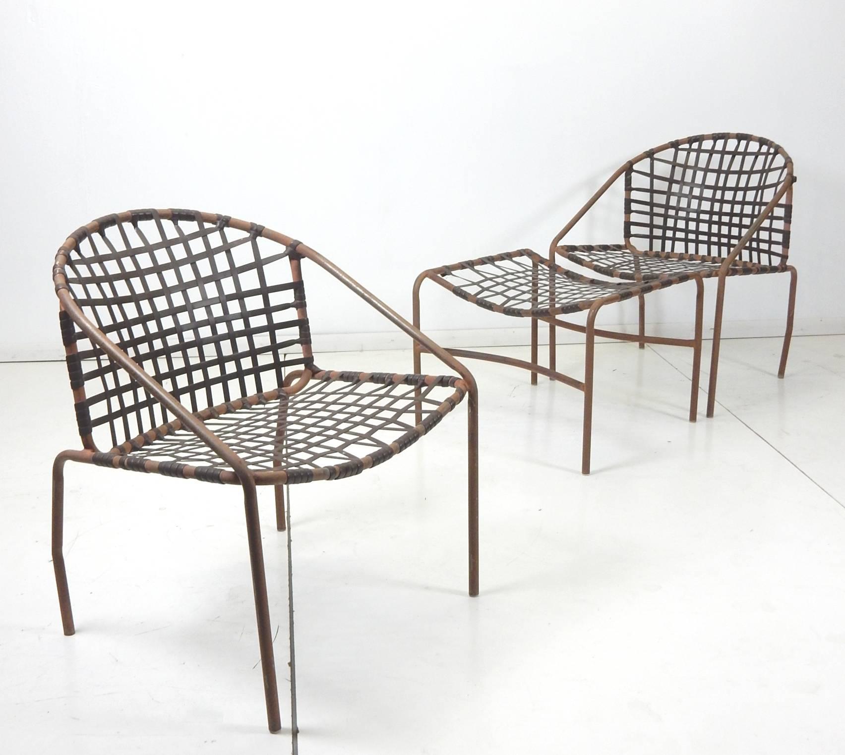 Set of six brown Jordan ~Kantan~ lounge chairs with single ottoman by Tadao Inoye,
circa 1960s. Dark brown webbing. Faded brown finish.
Very comfortable chairs that look amazing.