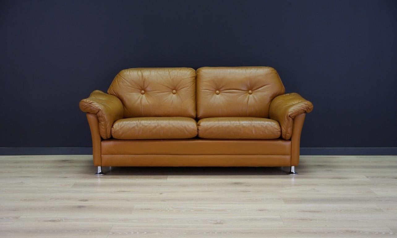 Stylish sofa of the 1960s-1970s. Beautiful straight line - Scandinavian design. Item upholstered with the original leather. Sofa in good condition with visible signs of wear (small scratches, abrasions and stains on the leather)

Dimensions:
