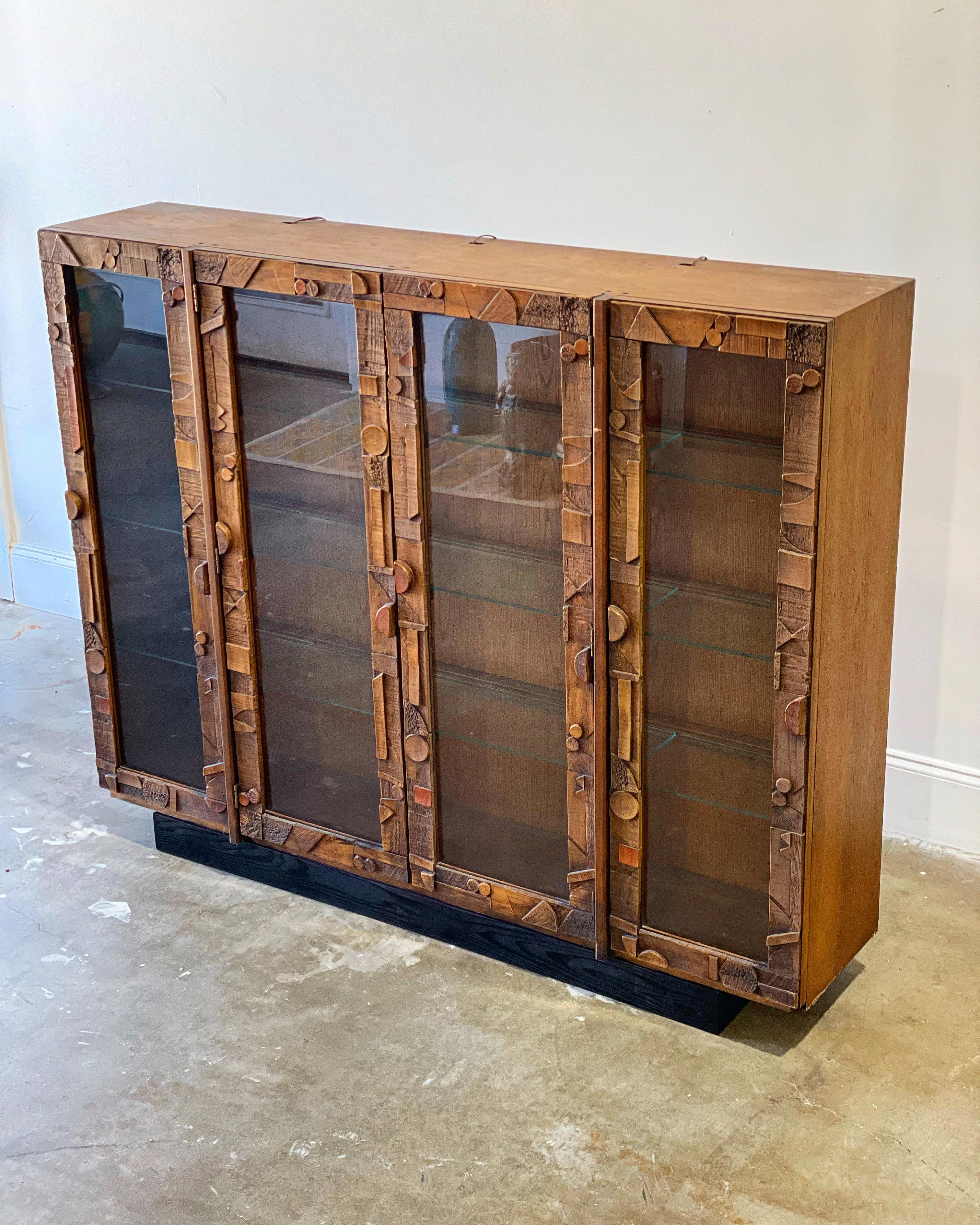 curio cabinet with glass shelves
