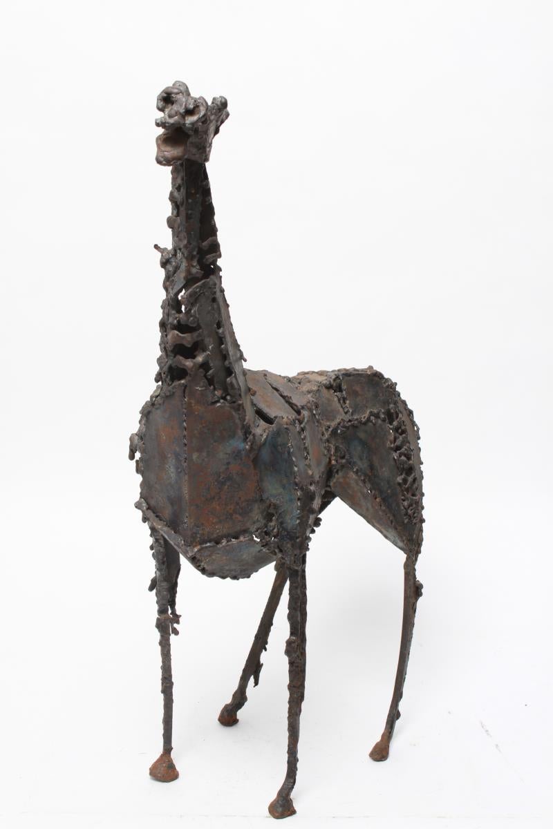 Mid-Century Modern Brutalist period neighing horse sculpture assembled from small welded steel plates. The piece has light rusting and is in great vintage condition.