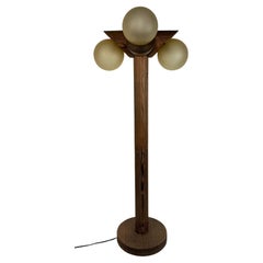 Midcentury brutalist oak floor lamp with 4 spheres, 1970s  by Temde Leuchten