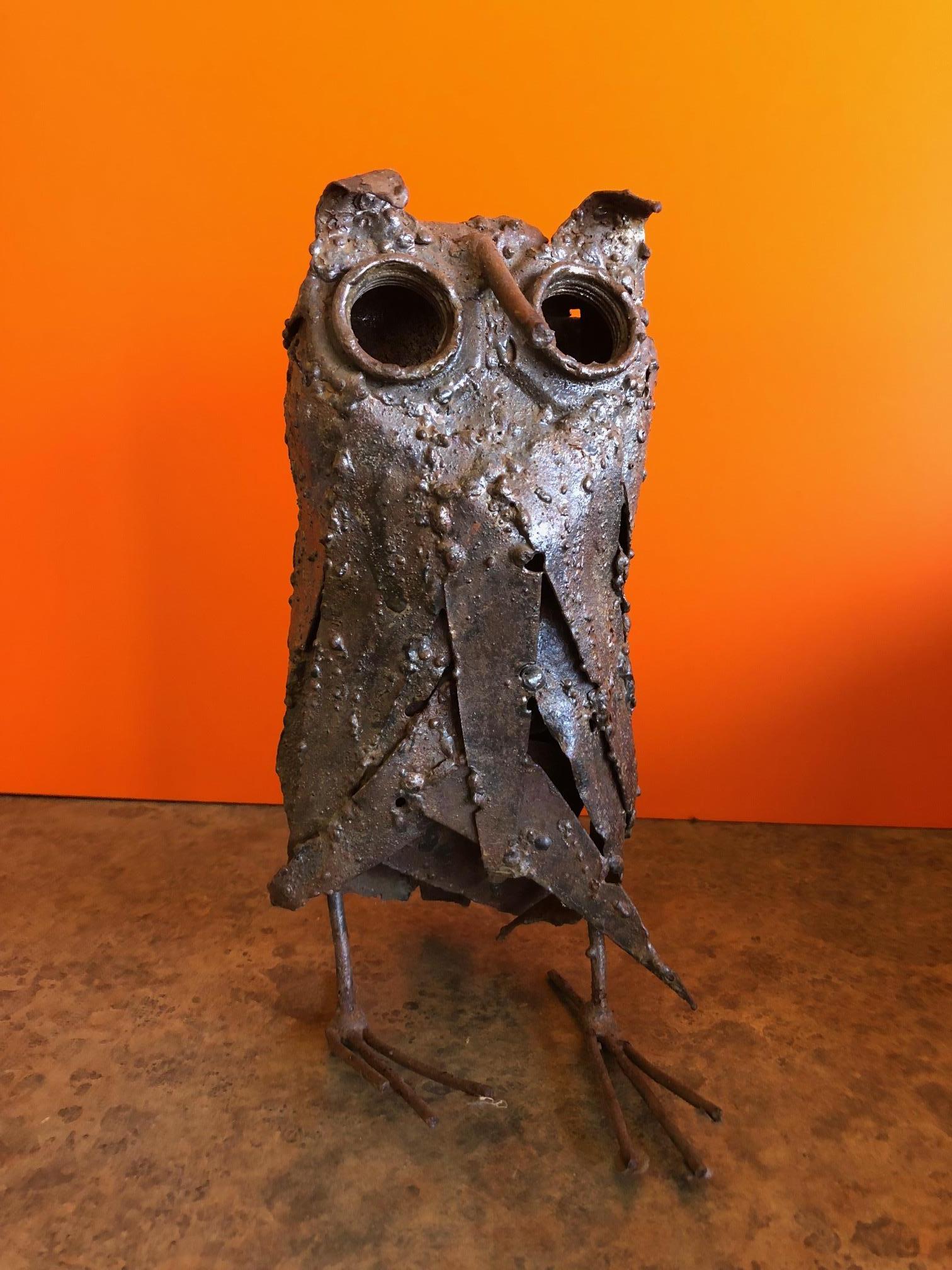 A very cool midcentury brutalist owl sculpture, circa 1960s. The piece is 9.5