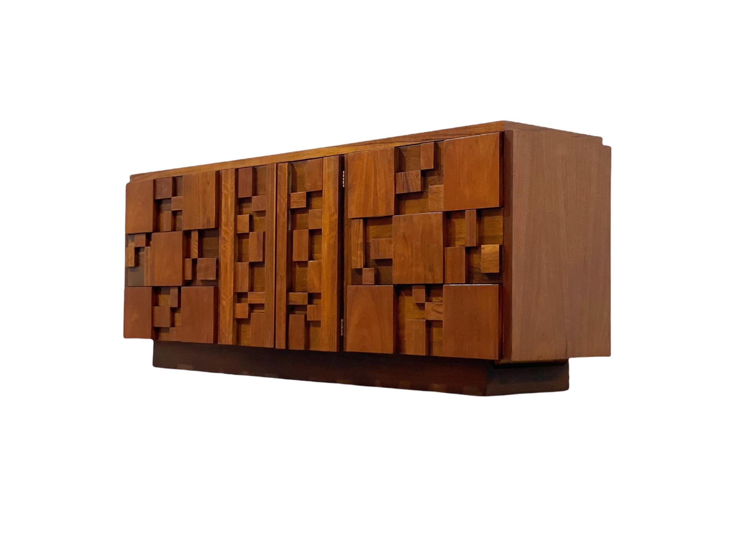 Stunning 9 drawer mosaic style Brutalist dresser from the Staccato line by Lane. Highly figured black walnut - each 