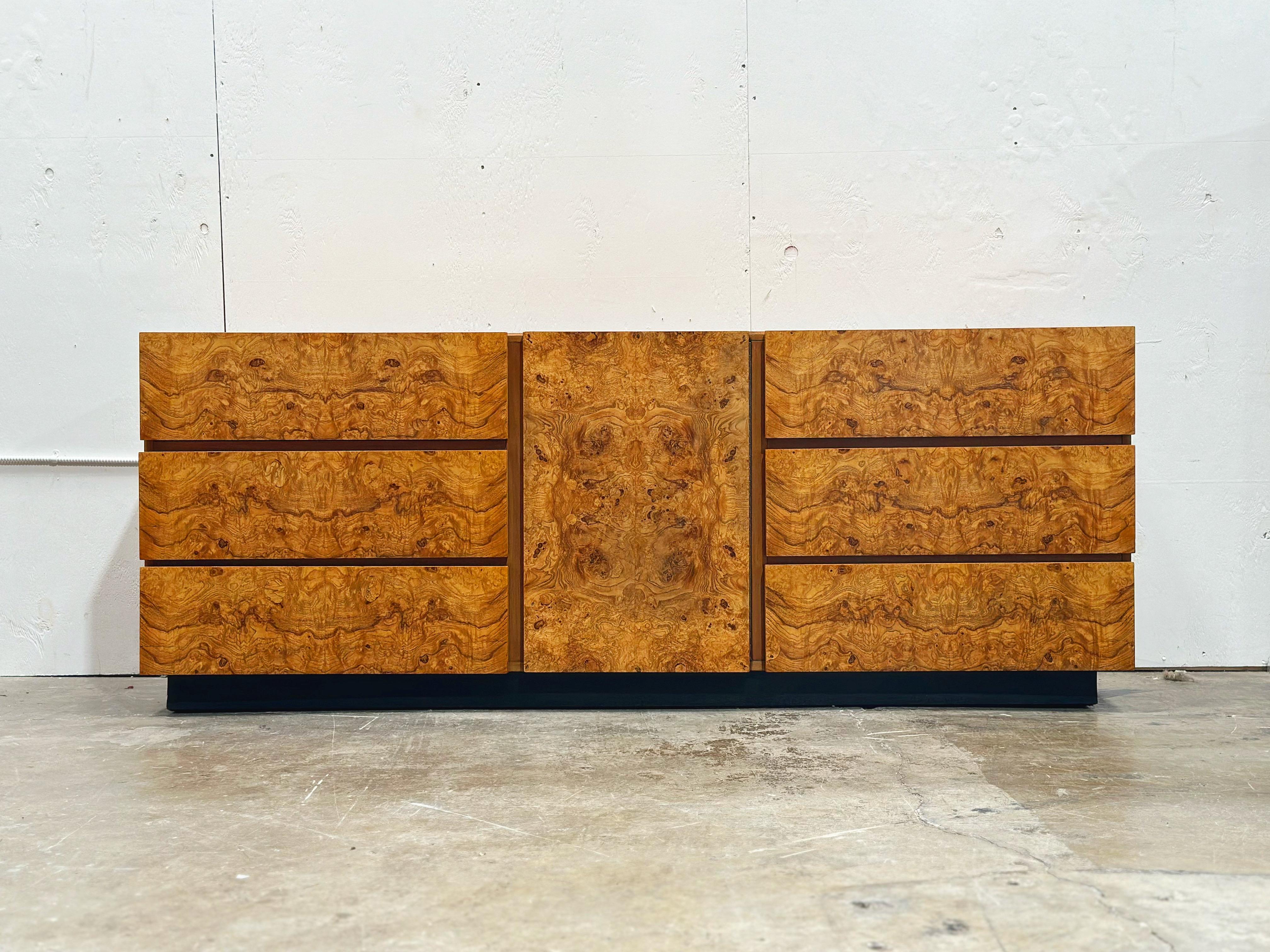 Vintage burled olive wood long dresser by Roland Carter for his Alpha series, produced by Lane, circa 1970s. Repetitive book matched grain on the six drawer and middle cabinet door facades. Clean organic modern lines. Fully restored and in excellent
