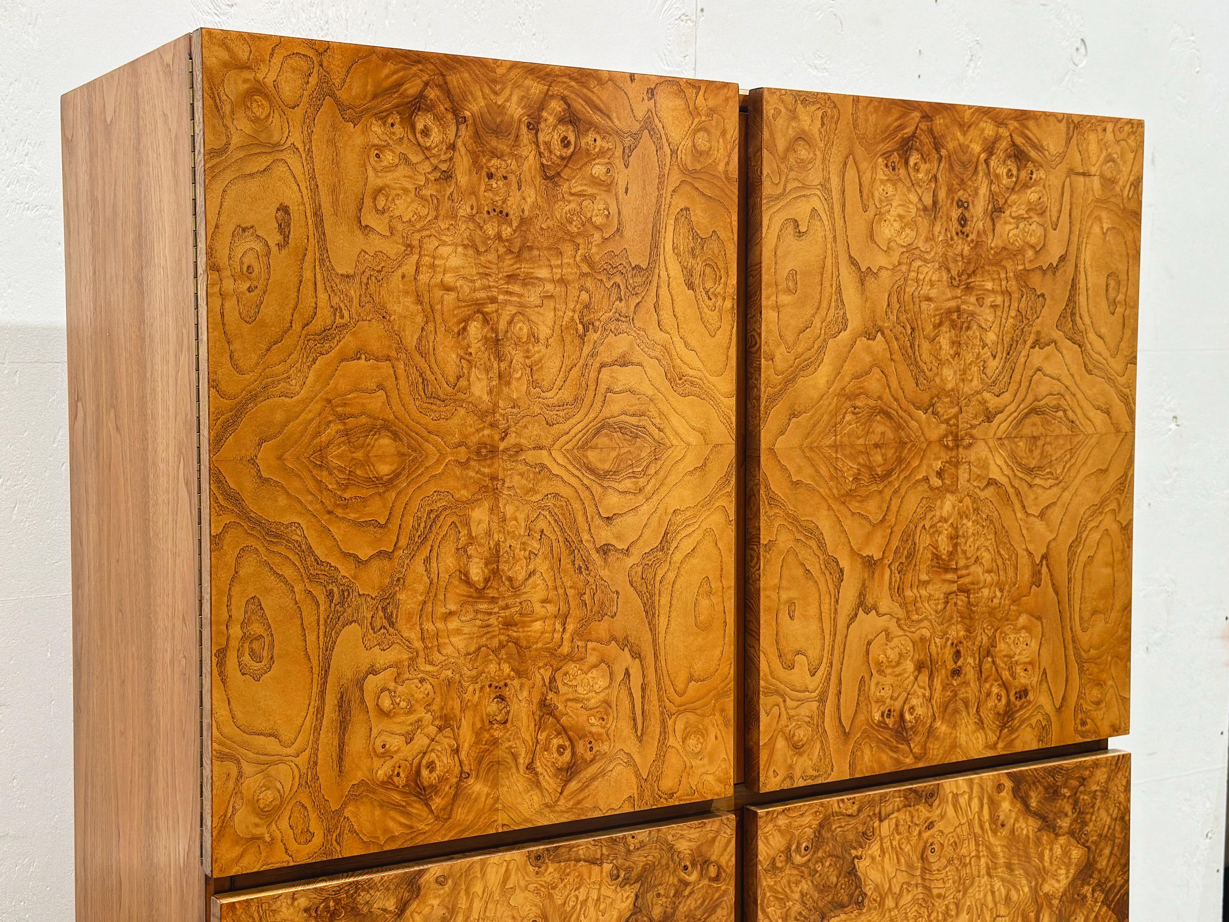 Vintage burled olive wood gentleman's chest or armoire by Roland Carter for Lane, circa 1970s. Repetitive book matched grain on the drawer and cabinet door facades. Clean organic modern lines. Fully restored and in excellent condition. No issues of