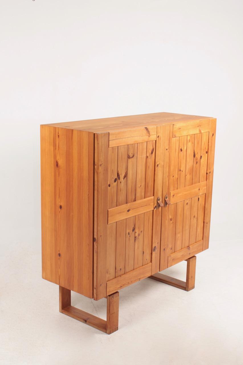 Scandinavian Modern Midcentury Cabinet in Pine with Leather handles, Danish Design, 1970s For Sale