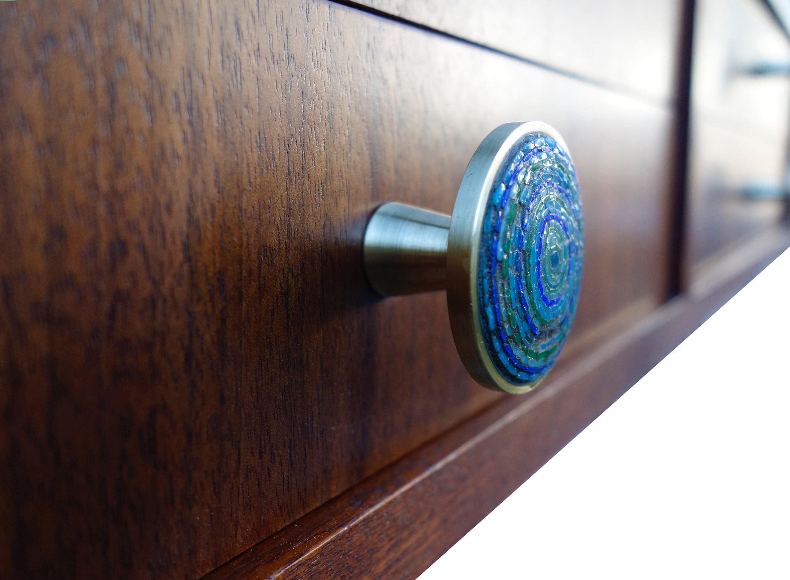 For your consideration is this simply beautiful miniature set of drawers featuring black walnut and brass pulls. The cabinet was crafted in Finland and the knobs are made in Italy designed by Evelyn Ackerman with blue micro mosaic inlay. This piece