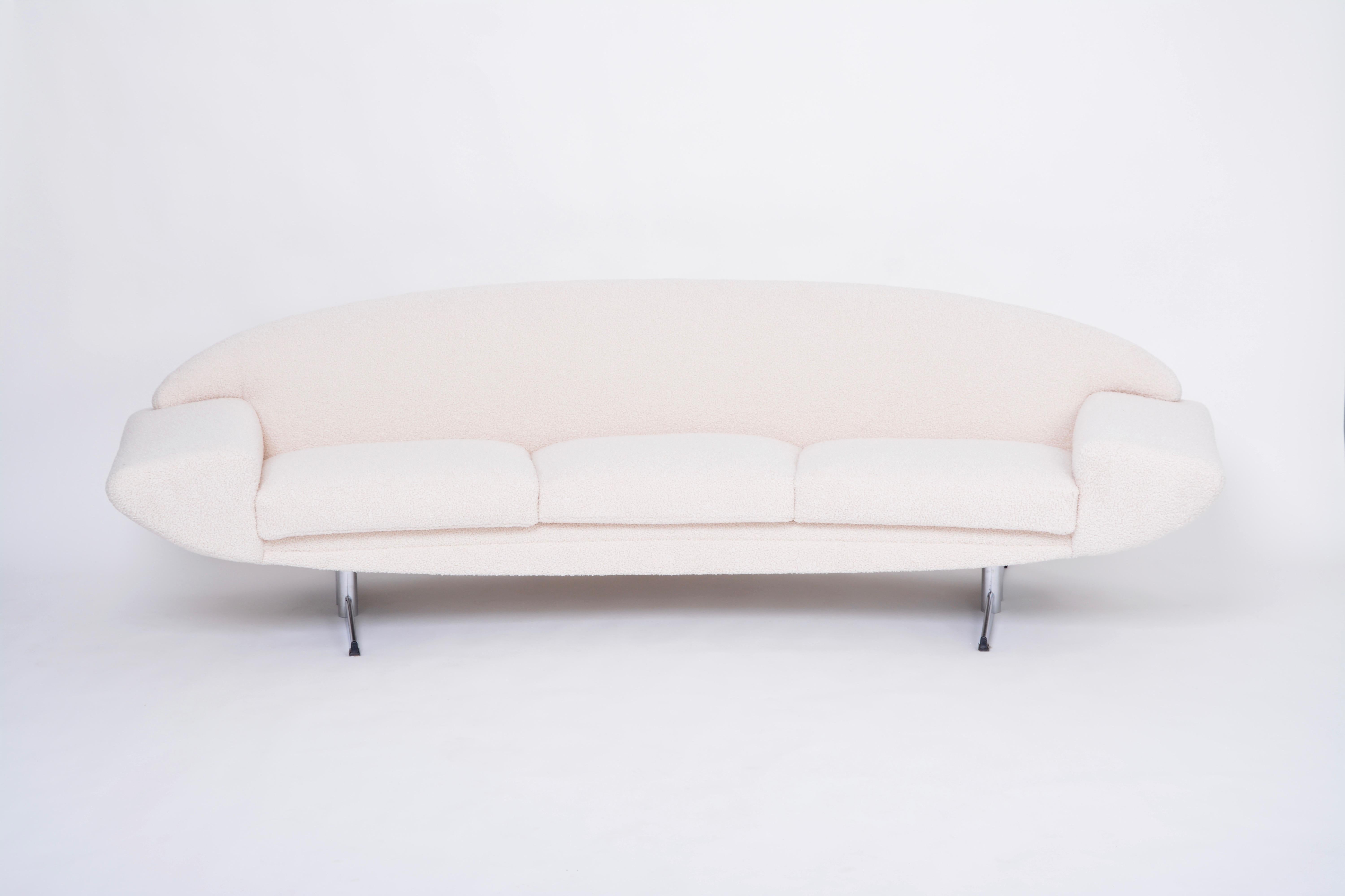 This is an absolute iconic piece of Scandinavian Midcentury Modern design. Johannes Andersen designed the Capri series consisting of a sofa, armchairs and a coffee table all produced by Swedish company Trensum. 
The sofa is is especially beautiful