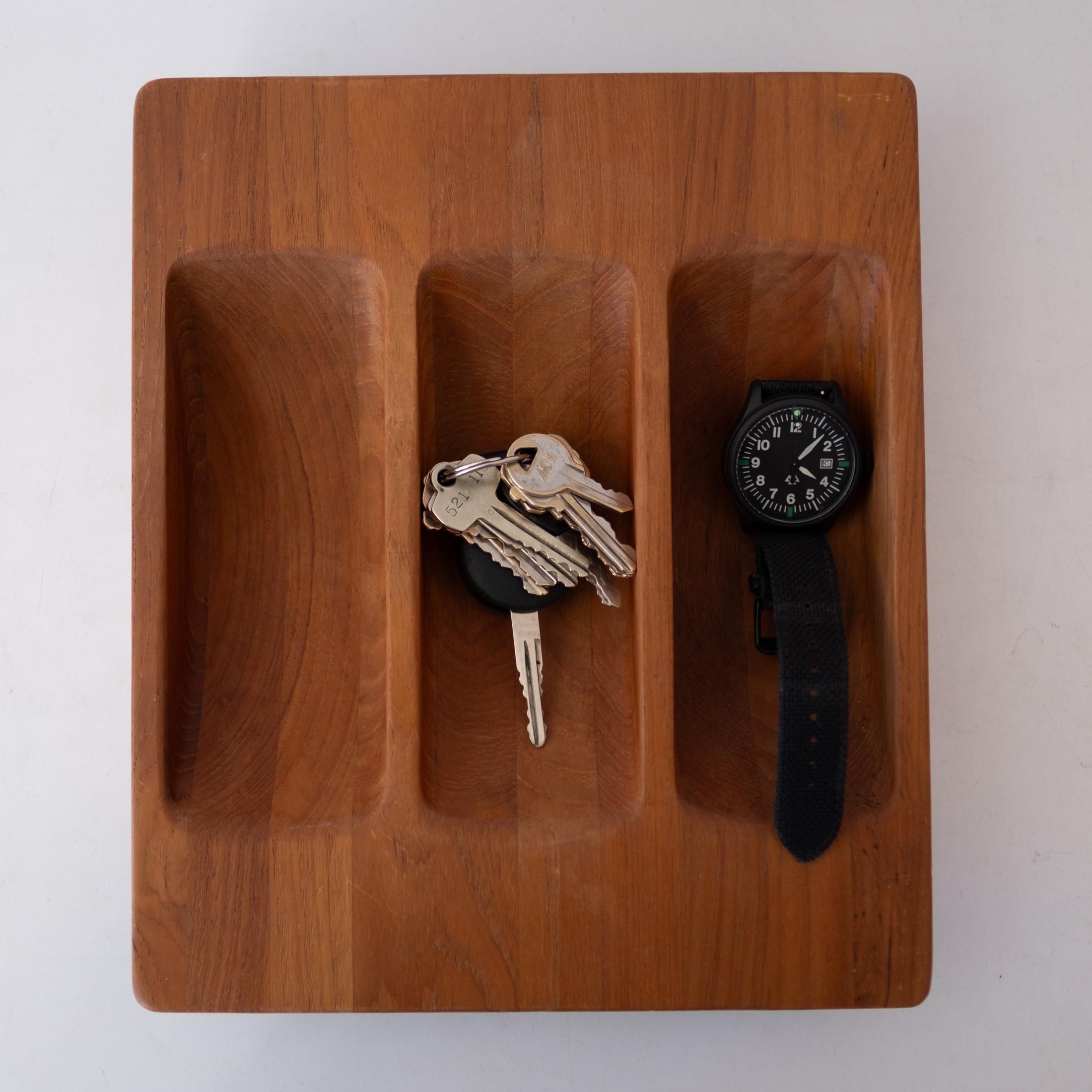 Catch all by Jens Quistgaard for Dansk. Great for a watch holder or keys. Solid teak with early Dansk mark, Denmark, 1950s.
