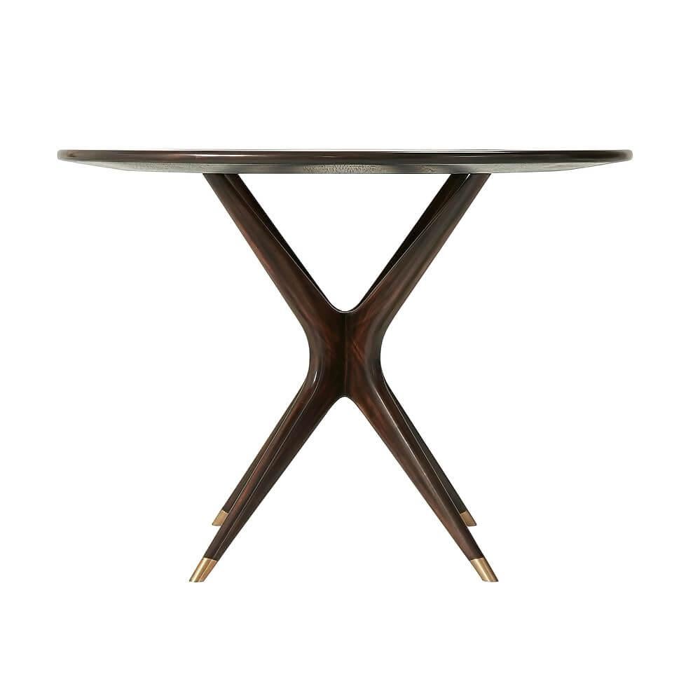 Midcentury center table with Amara ebony veneer and ebonized mahogany with brass accents.

Dimensions: 42