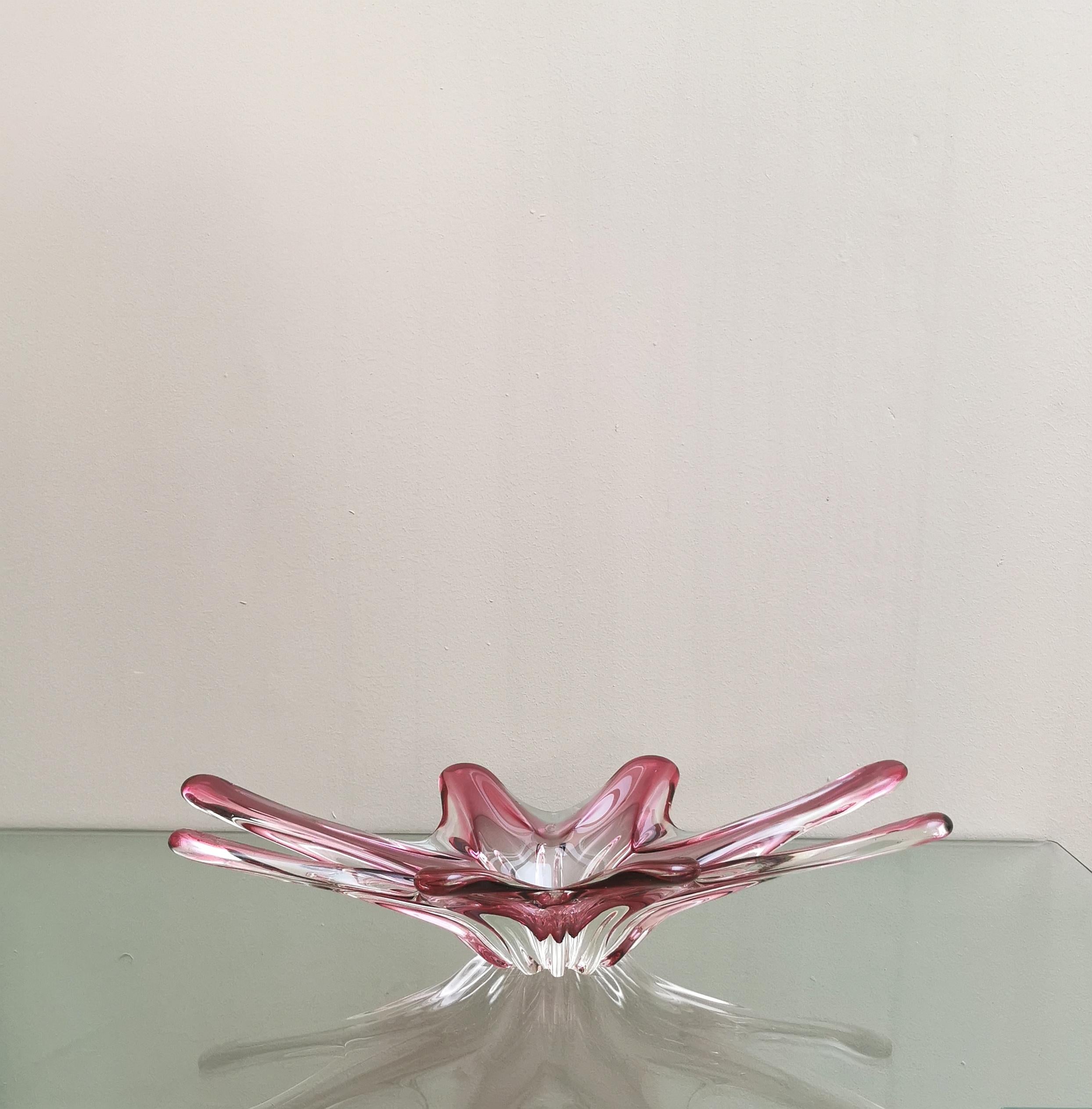 Large centerpiece in Murano glass submerged in the shades of fuchsia and transparent. Made in Italy in the 70s.