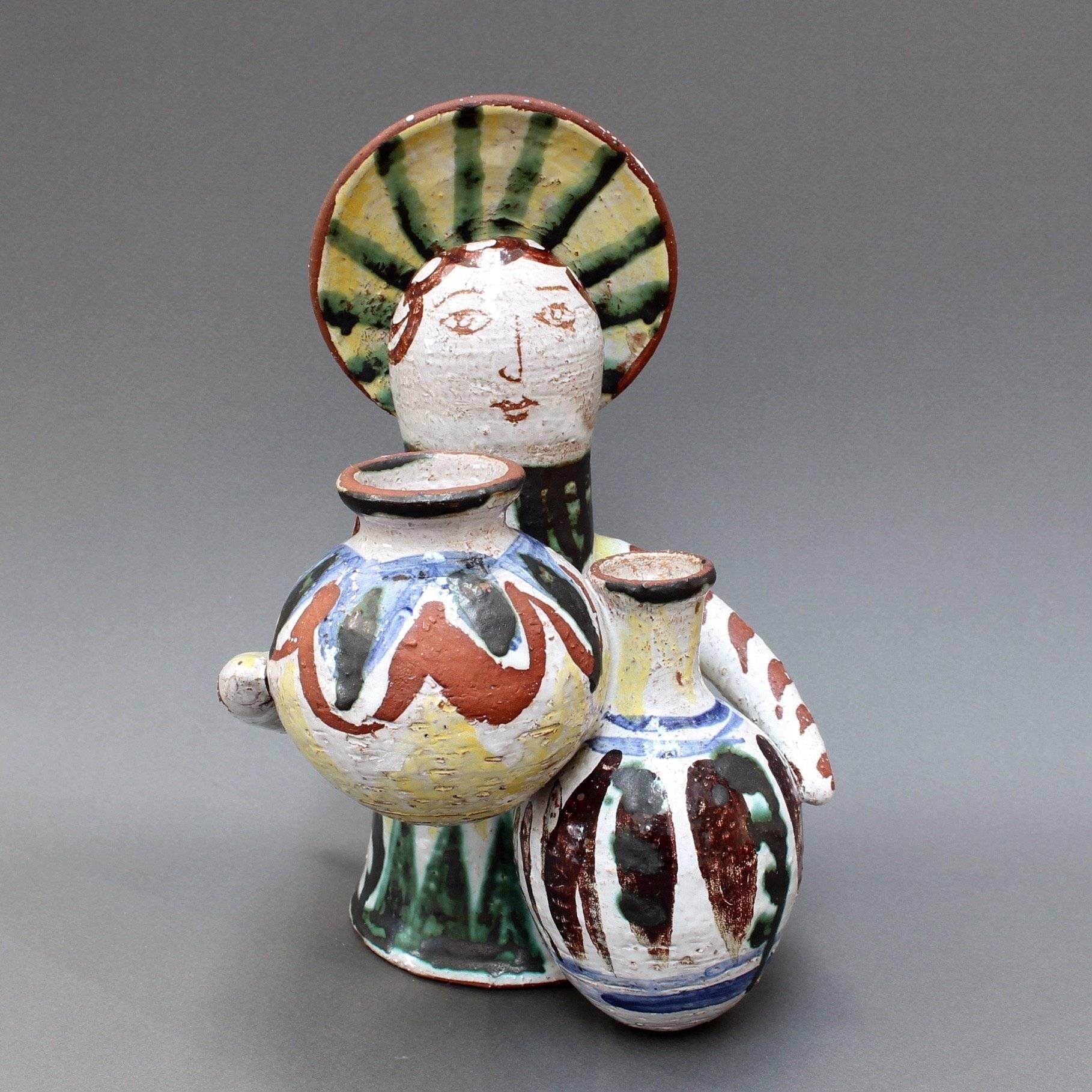 Midcentury ceramic angel with amphorae sculpture (c. 1950s). This beguiling ceramic piece was discovered in the south of France. Probably should be attributed to one of the Vallauris ceramicists, it is simply marked 'R' on the inner base of the