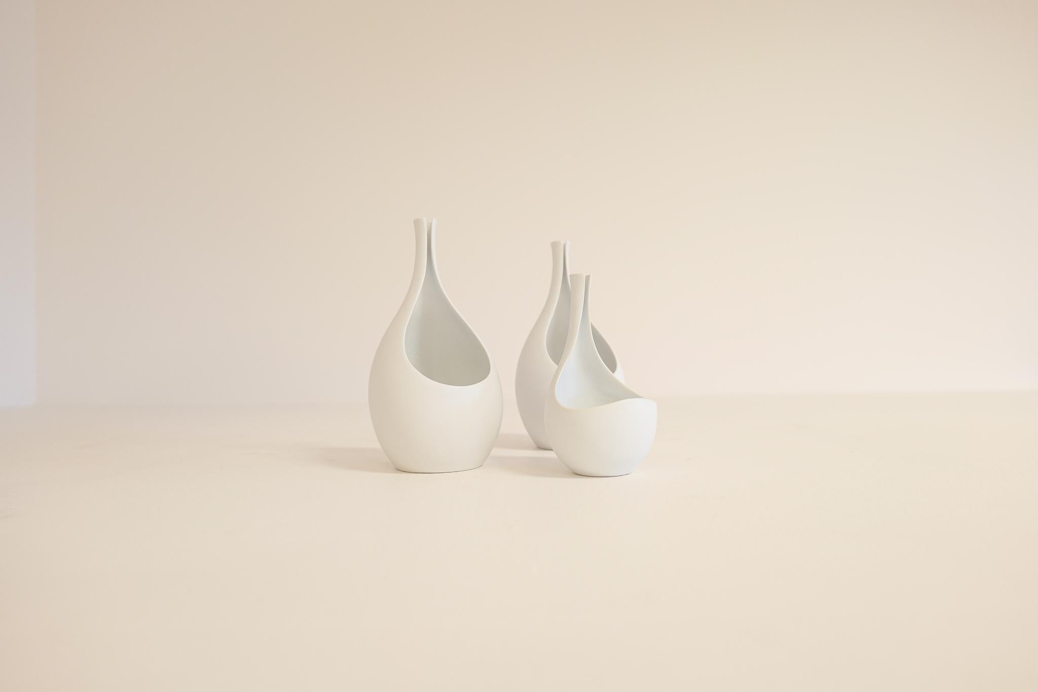 The pungo vase made in Sweden 1950s by the master Stig Lindberg for Gustavsberg. The pungo vase have the most beautiful form and with its matt white glaze this is a piece for many environments. Here is a collection of two large ones and one small.