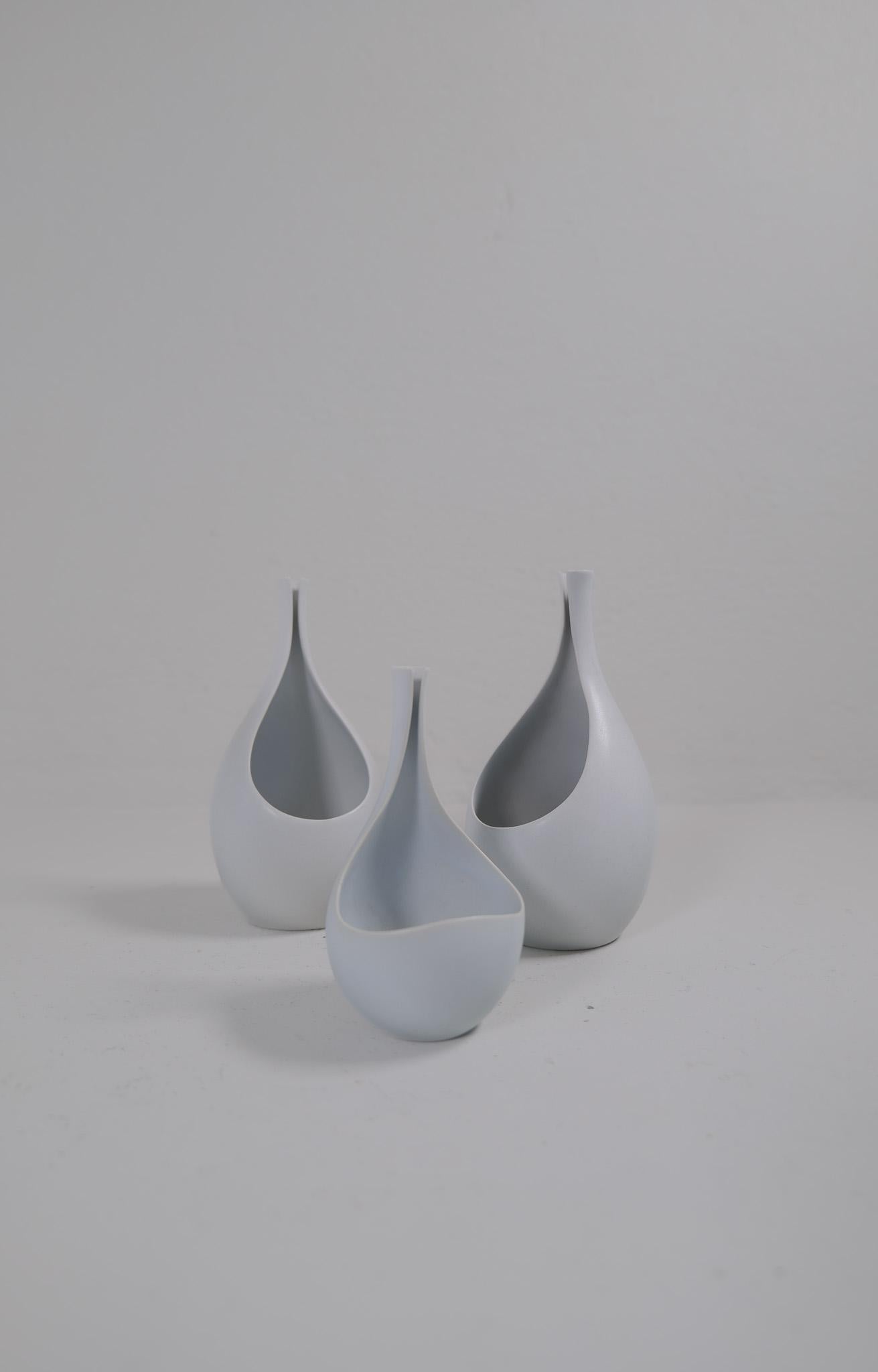 The pungo vase made in Sweden 1950s by the master Stig Lindberg for Gustavsberg. The pungo vase have the most beautiful form and with its matt white glaze this is a piece for many environments. Here is a collection of two large ones and one small.