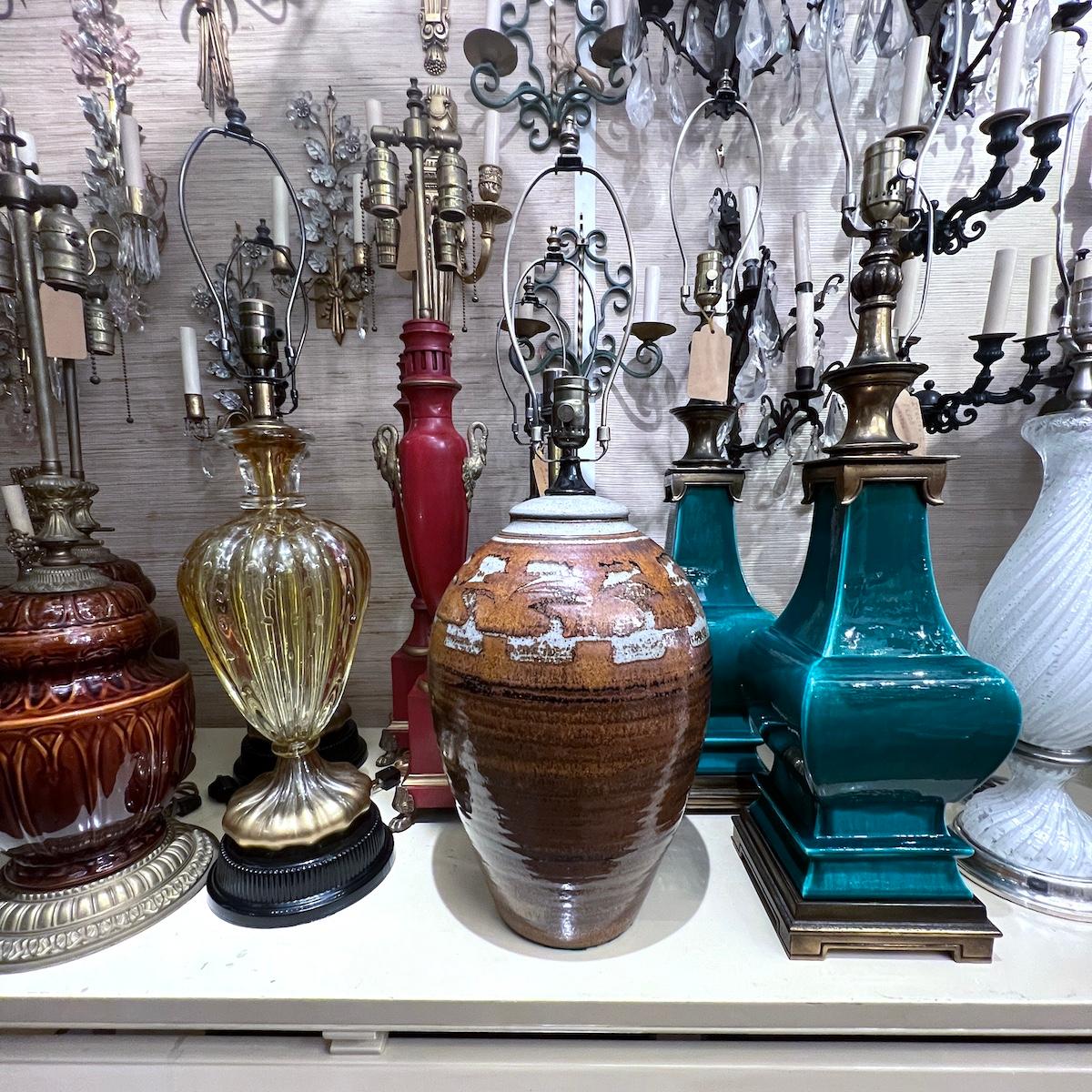 A circa 1960's Italian ceramic table lamp with brown tones.

Measurements:
Height of body: 16