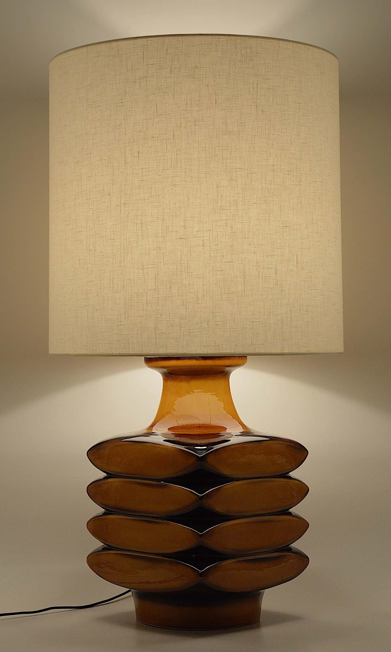 Midcentury floor / table lamp by Cari Zalloni  for Steuler, Germany, 1960s. Ceramic & fabric. Ecru lampshade (new). Measures: Full height 84.5cm-33.25 inches; full diameter 45cm-17.7 inches. Height of the ceramic base 40cm-15.75 inches; diameter