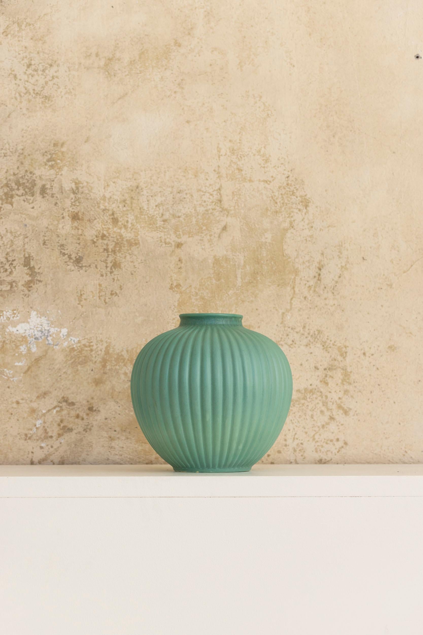 San Cristoforo ceramic green vase by Gio Ponti and Giovanni Gariboldi 
manufactured by Richard Ginori. 
Rare color and manufacturing.
Signed Richard Ginori on the bottom.
Perfect vintage condition
Italy 1947
It can match with other 3 pieces from the