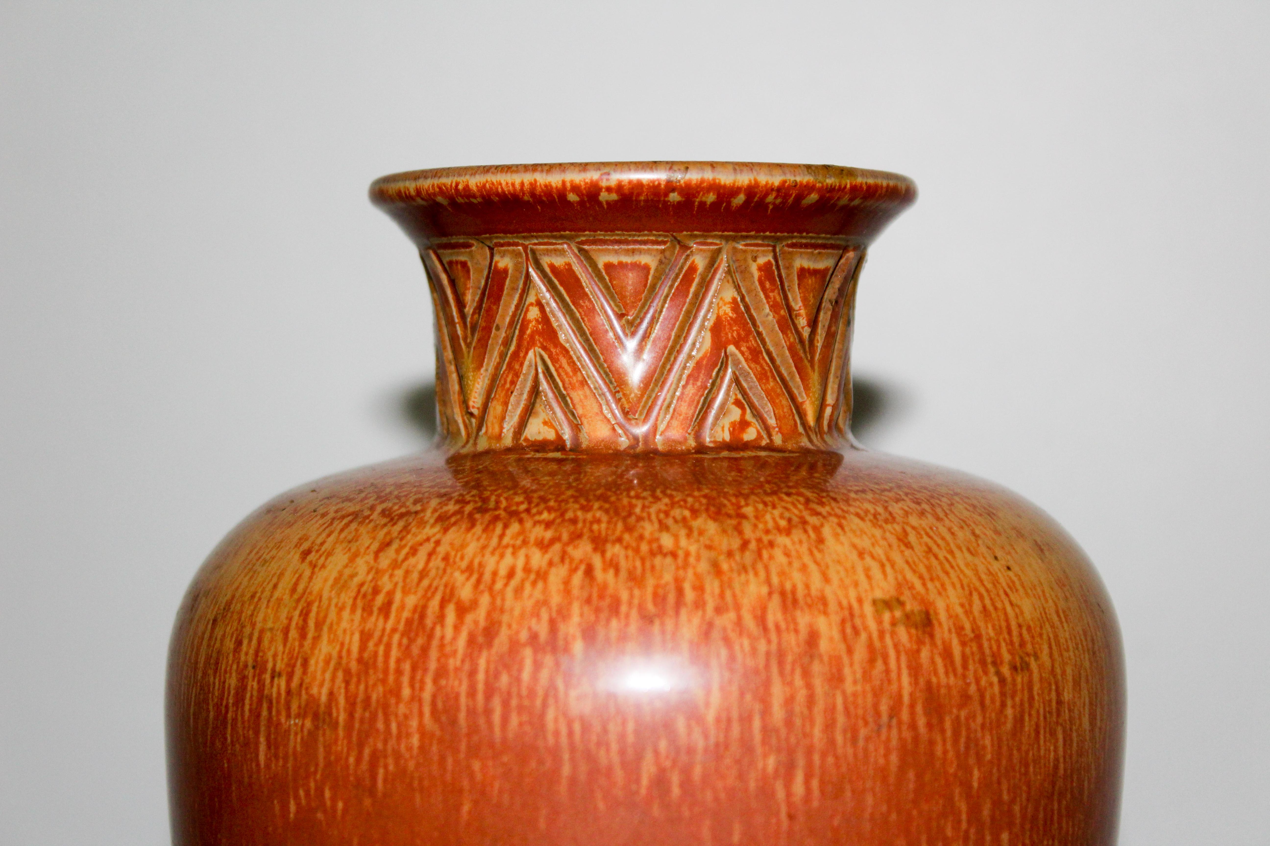 Midcentury ceramic vase by Swedish designer and potter Gunnar Nylund for Rörstrand. The vase is in good vintage condition with signs of usage consistent with age.