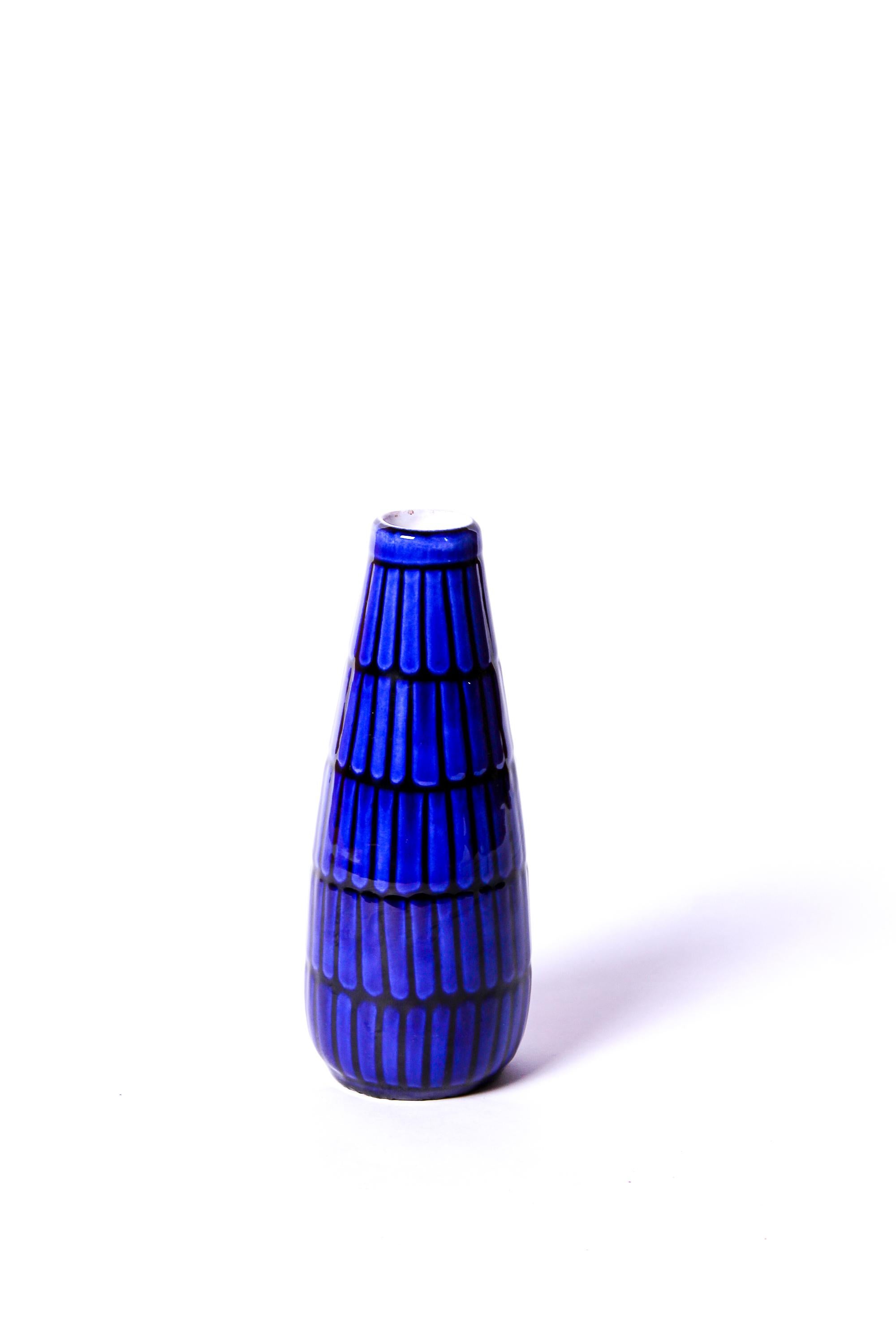 A very decorative blue ceramic vase designed by Swedish designer Ingrid Atterberg. The vase has a wonderful blue glaze and was produced at Upsala-Ekeby in Sweden around 1950.

Very good vintage condition.
