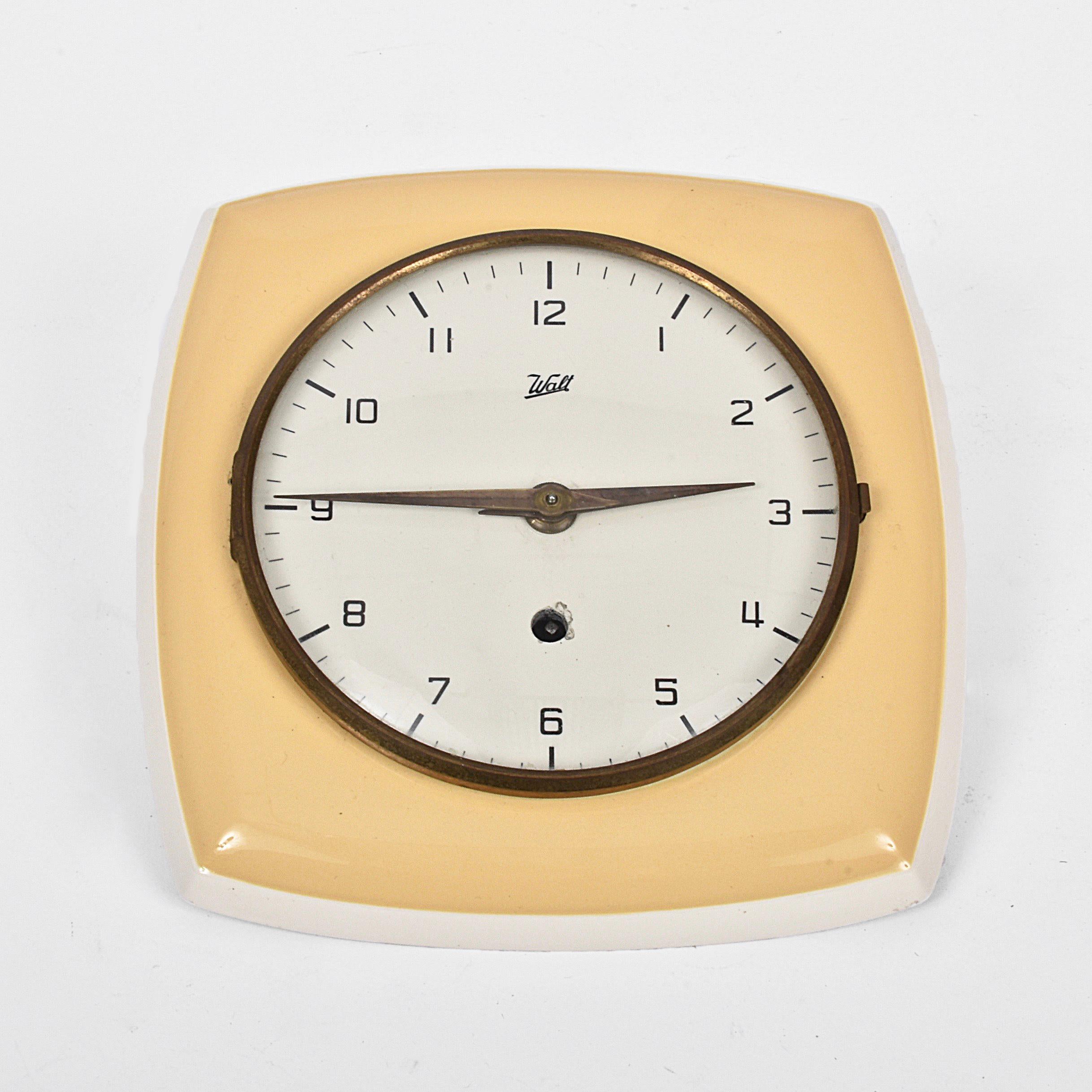 Ceramic wall clock, by Walt. Load with key, original included.
working.