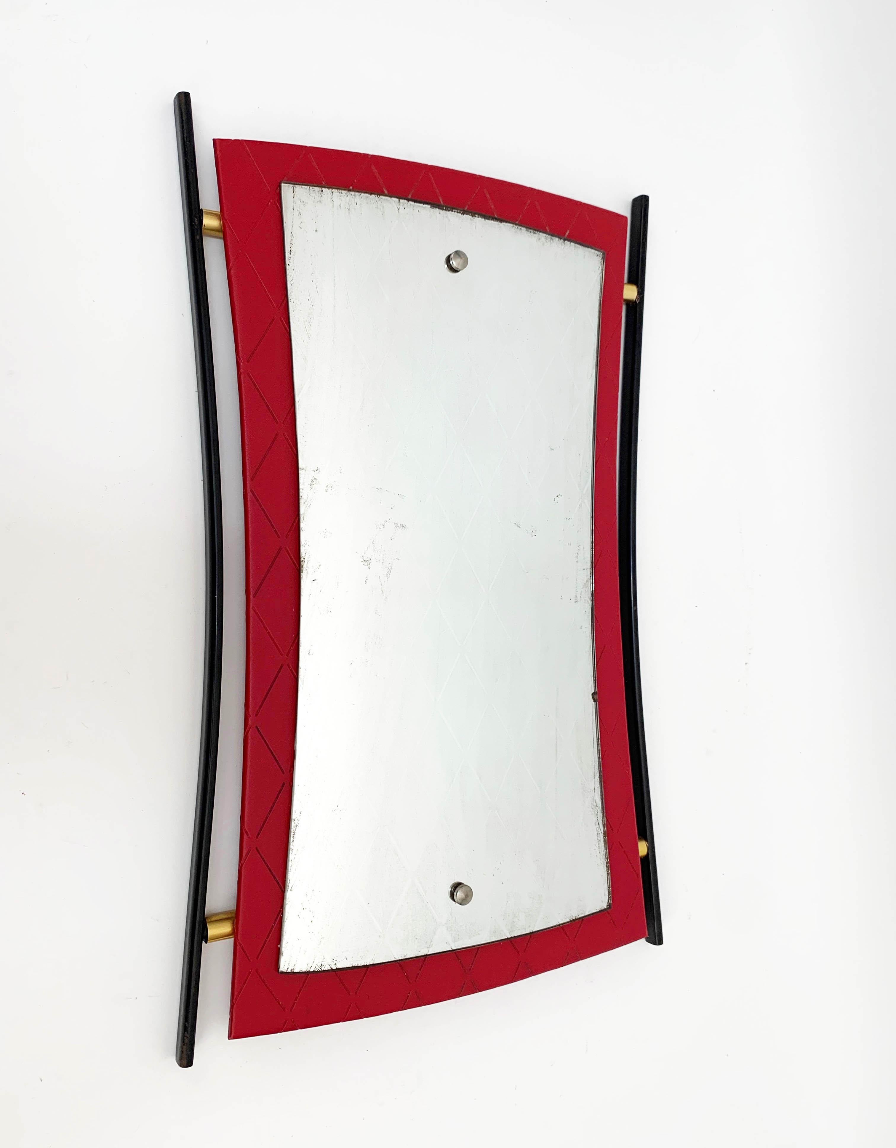 Amazing midcentury enameled iron, red sky plastic covered wood and brass finishes. This amazing piece design is attributed to Cesare Lacca and was produced in Italy during 1950s.

This item is spectacular due to its lines, as it has concave lines