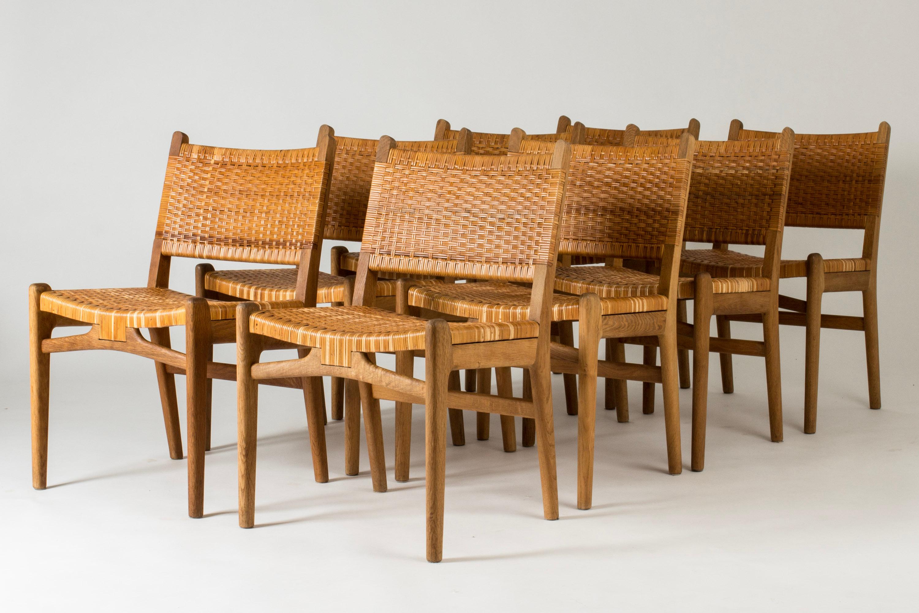 Set of eight rare “CH-31” dining chairs by Hans J. Wegner, made from oak with wreathed rattan backs and seats.